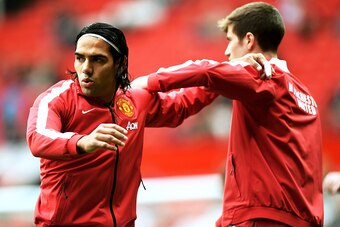 MANCHESTER, ENGLAND - SEPTEMBER 27:  Radamel Falcao Garcia of Manchester United warms up with team-mate Paddy McNair before the Barclays Premier League match between Manchester United and West Ham United at Old Trafford on September 27, 2014 in Manchester
