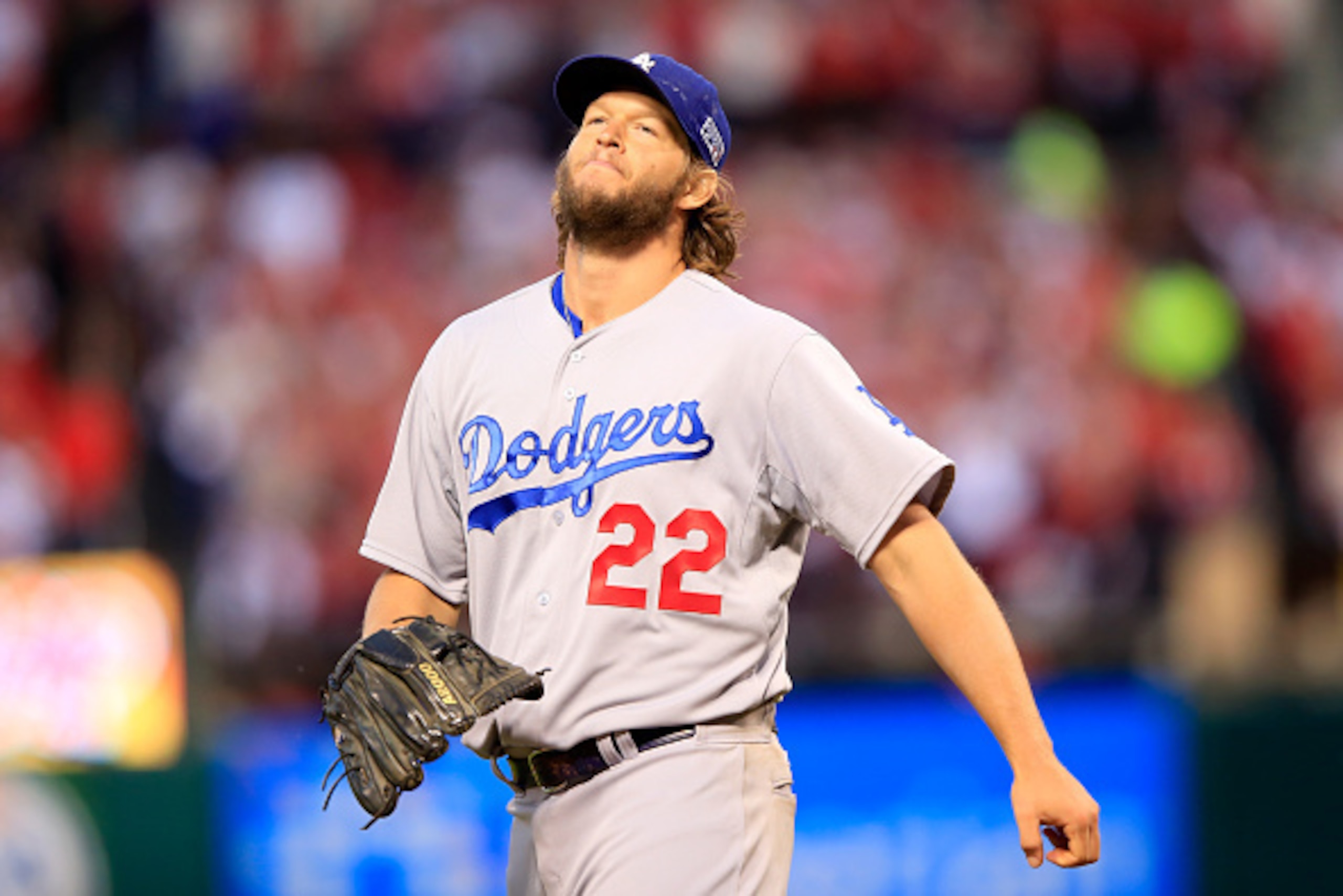 ST LOUIS, MO - OCTOBER 07: Clayton Kershaw #22 of the Los Angeles Dodgers reacts after giving up a hit in the seventh inning against the St. Louis Cardinals in Game Four of the National League Divison Series at Busch Stadium on October 7, 2014 in St Louis ST LOUIS, MO - OCTOBER 07: Clayton Kershaw #22 of the Los Angeles Dodgers reacts after giving up a hit in the seventh inning against the St. Louis Cardinals in Game Four of the National League Divison Series at Busch Stadium on October 7, 2014 in St Louis