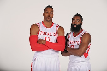 HOUSTON, TX - SEPTEMBER 29:  Dwight Howard #12 and James Harden #13 of the Houston Rockets pose during Houston Rockets Media Day on September 29, 2014 in Houston, Texas. NOTE TO USER: User expressly acknowledges and agrees that, by downloading and or usin