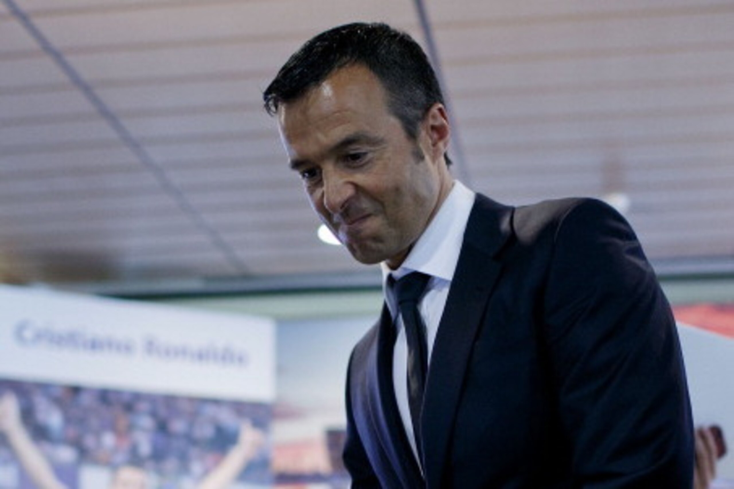 MADRID, SPAIN - SEPTEMBER 15:  Crsitiano Ronaldo«s agent Jorge Mendes takes seat prior to start the press conference after his signing contract renewal For Real Madrid at Estadio Santiago Bernabeu on September 15, 2013 in Madrid, Spain.  (Photo by Gonzalo