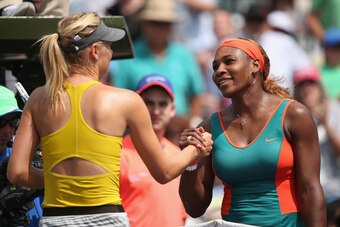KEY BISCAYNE, FL - MARCH 27:  Serena Williams of the United States shakes hands at the net after her straight sets victory against Maria Sharapova of Russia during their semi final round match during day 11 at the Sony Open at Crandon Park Tennis Cente on