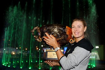 BEIJING, CHINA - OCTOBER 05:  Maria Sharapova of Russia poses with the winners trophy after the Women's Single Final on day nine of the China Open at the China National Tennis Cente on October 5, 2014 in Beijing, China.  (Photo by Chris Hyde/Getty Images)