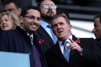MANCHESTER, ENGLAND - OCTOBER 24:  City Chairman Khaldoon Al Mubarak (L) and Chief Executive Garry Cook look on during the Barclays Premier League match between Manchester City and Arsenal at City of Manchester Stadium on October 24, 2010 in Manchester, E