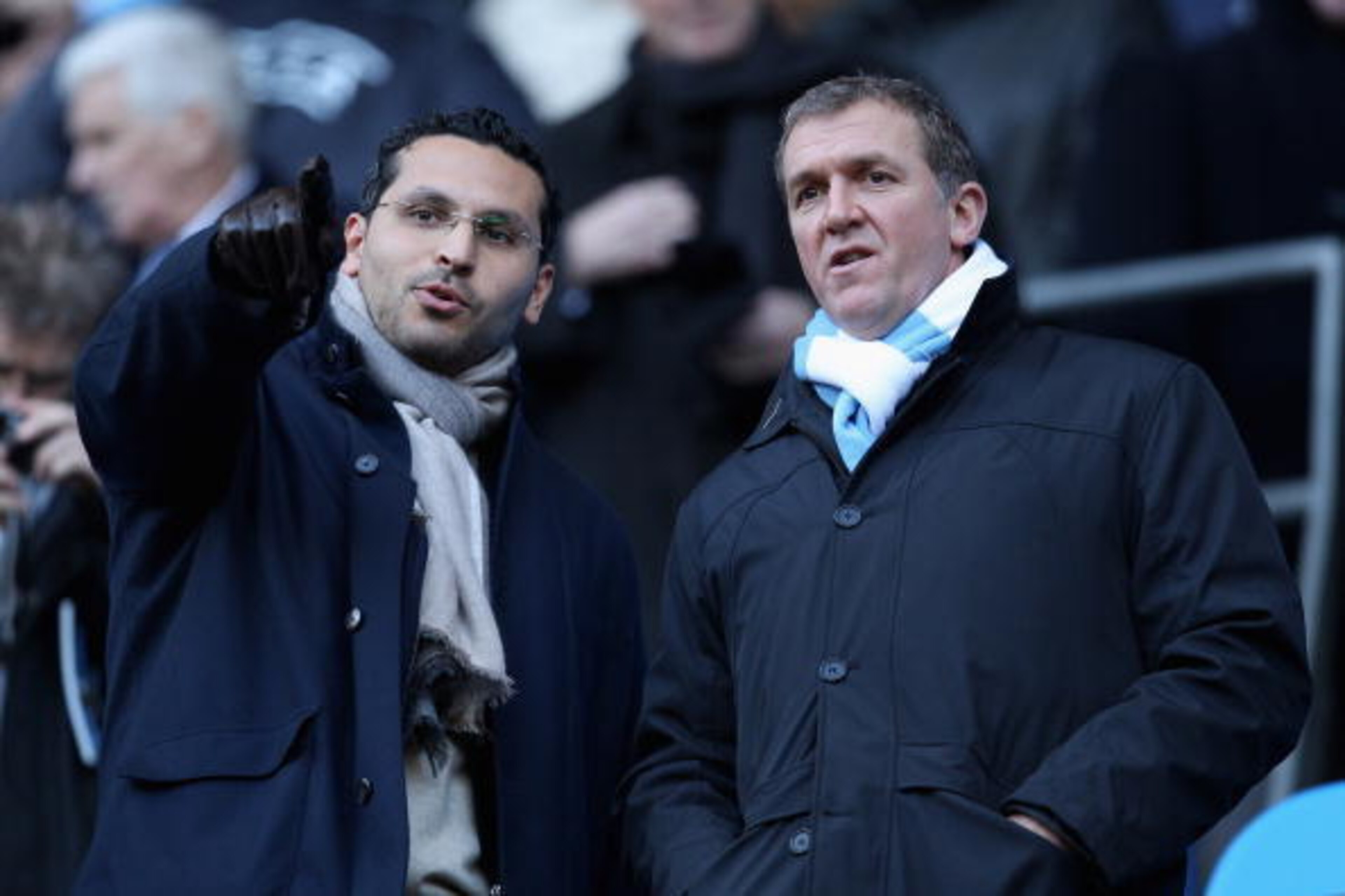 MANCHESTER, ENGLAND - JANUARY 31:  Manchester City Chairman Khaldoon al-Mubarak (L) and Chief Executive Garry Cook wait for the game to start prior to the Barclays Premier League match between Manchester City and Portsmouth at the City of Manchester Stadi