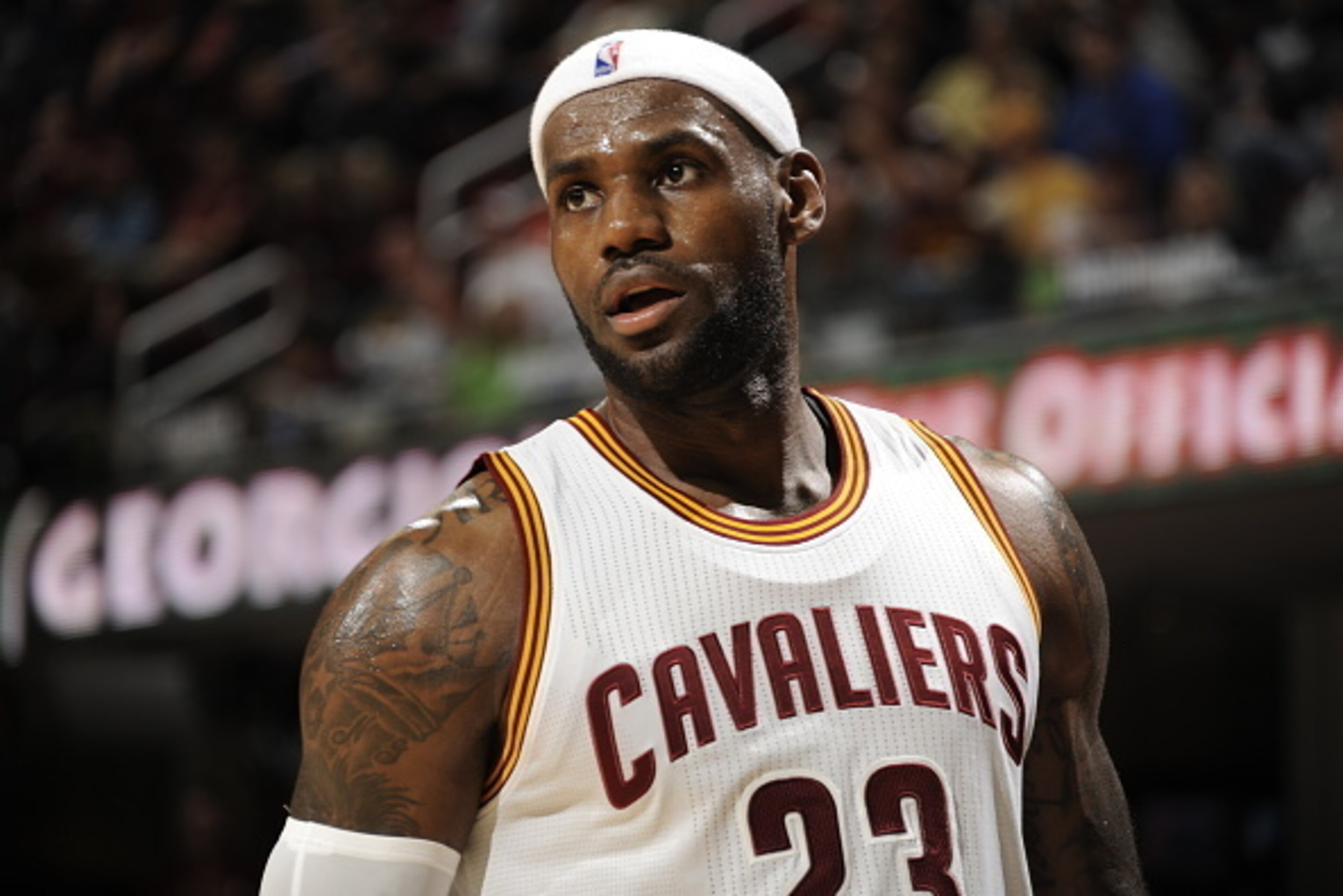 CLEVELAND, OH - OCTOBER 5:  LeBron James #23 of the Cleveland Cavaliers looks on during the game against Maccabi Tel Aviv at The Quicken Loans Arena on October 16, 2014 in Cleveland, Ohio. NOTE TO USER: User expressly acknowledges and agrees that, by down