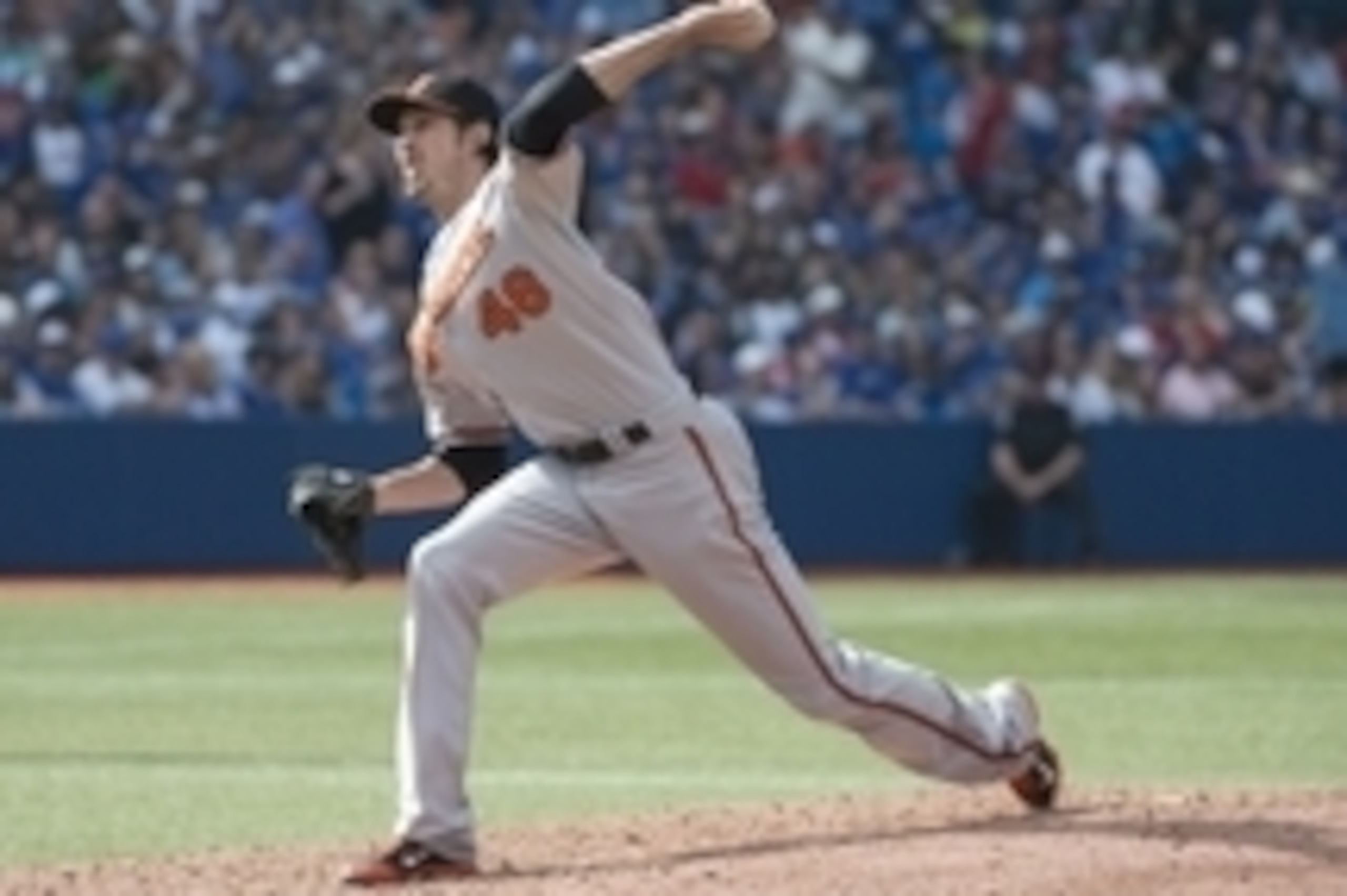 Sep 28, 2014; Toronto, Ontario, CAN; Baltimore Orioles relief pitcher Andrew Miller (48) throws a pitch during the seventh inning in a game against the Toronto Blue Jays at Rogers Centre. The Baltimore Orioles won 1-0. Mandatory Credit: Nick Turchiaro-USA