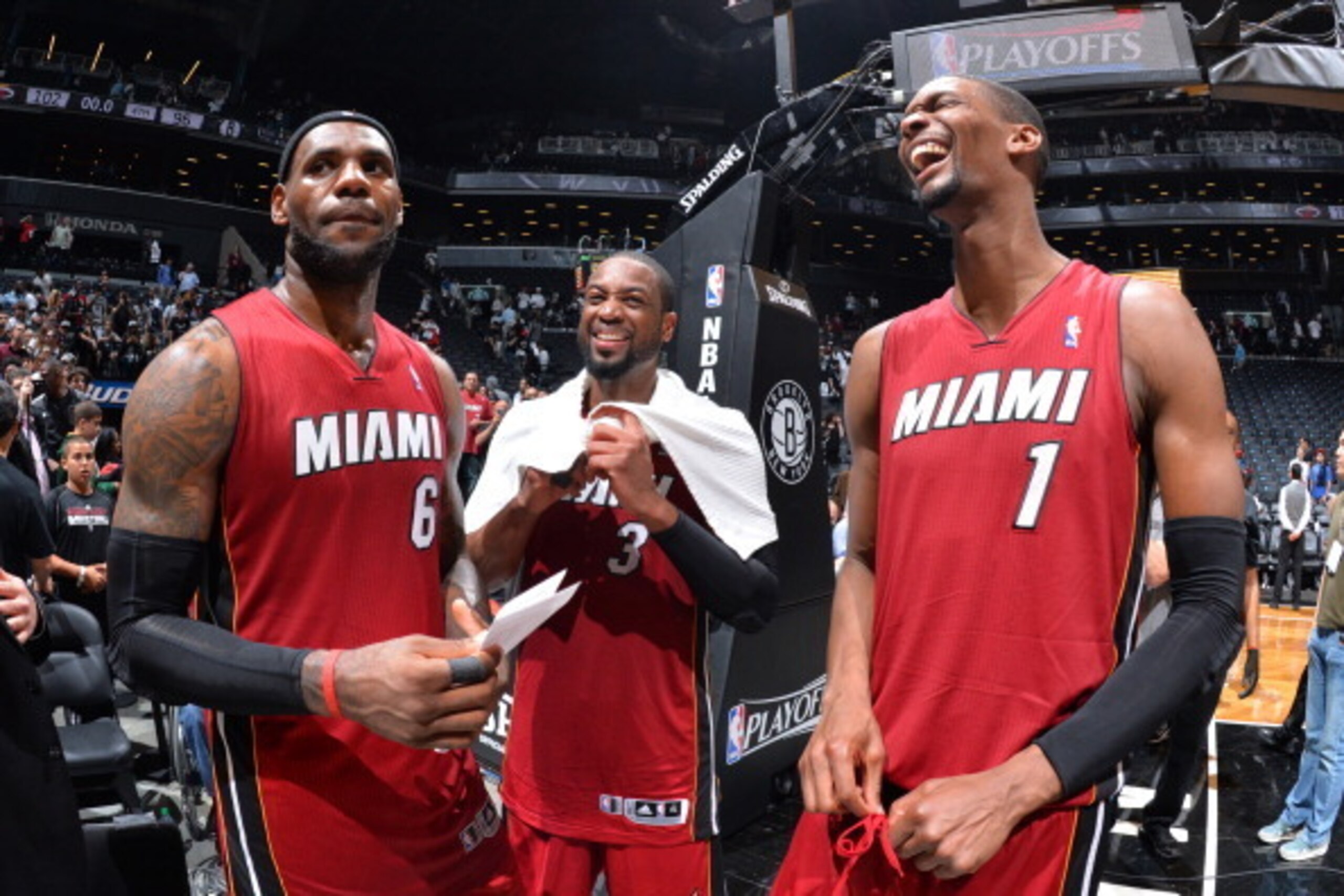 BROOKLYN, NY - MAY 12: LeBron James #6, Dwyane Wade #3 and Chris Bosh #1 of the Miami Heat celebrate after Game Four of the Eastern Conference Semifinals against the Brooklyn Nets on May 12, 2014 at Barclays Center in Brooklyn. NOTE TO USER: User expressl