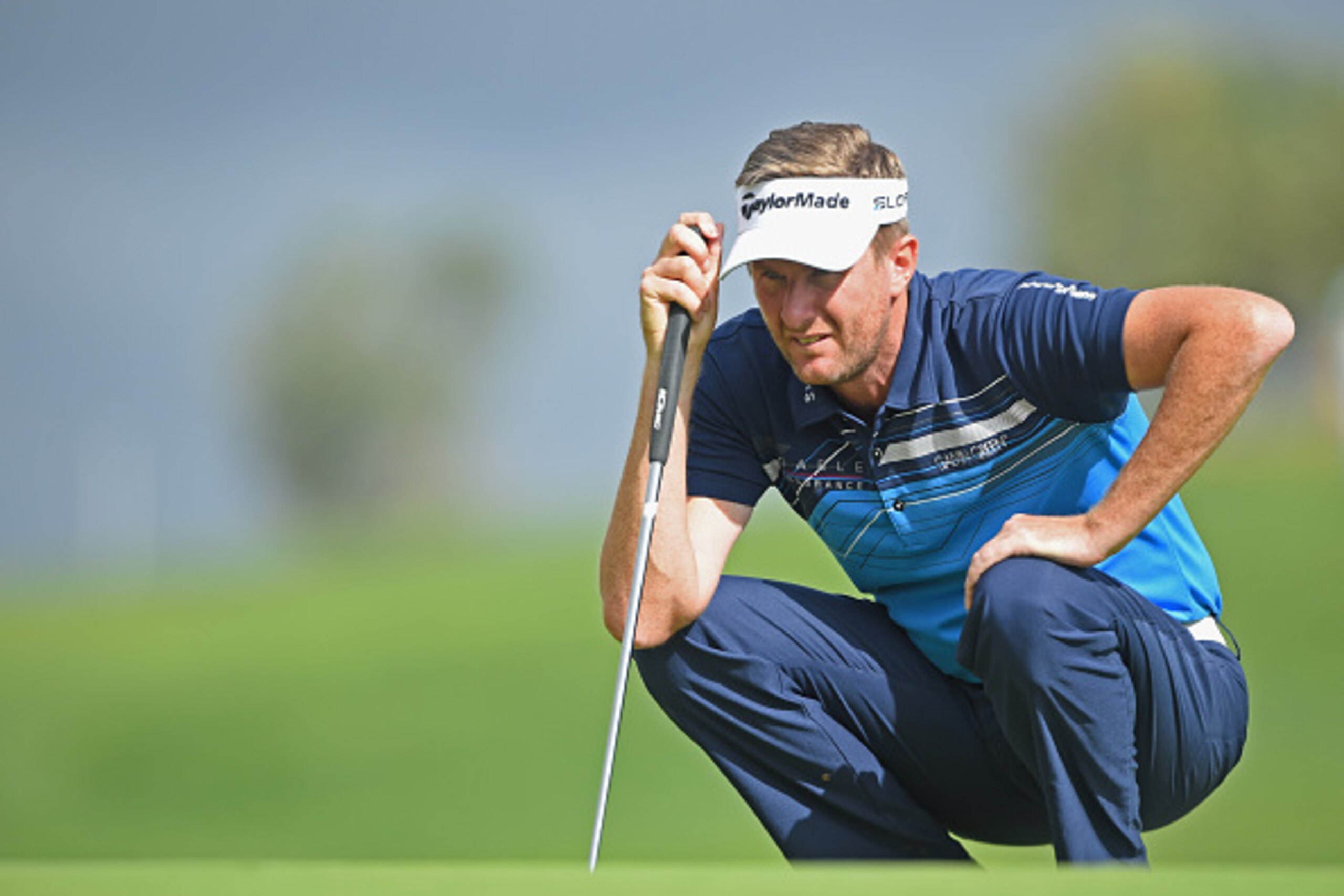 ALBUFEIRA, PORTUGAL - OCTOBER 09: David Lynn of England lines up a putt during the first round of the Portugal Masters at Oceanico Victoria Golf Club on October 9, 2014 in Albufeira, Portugal.  (Photo by Stuart Franklin/Getty Images)