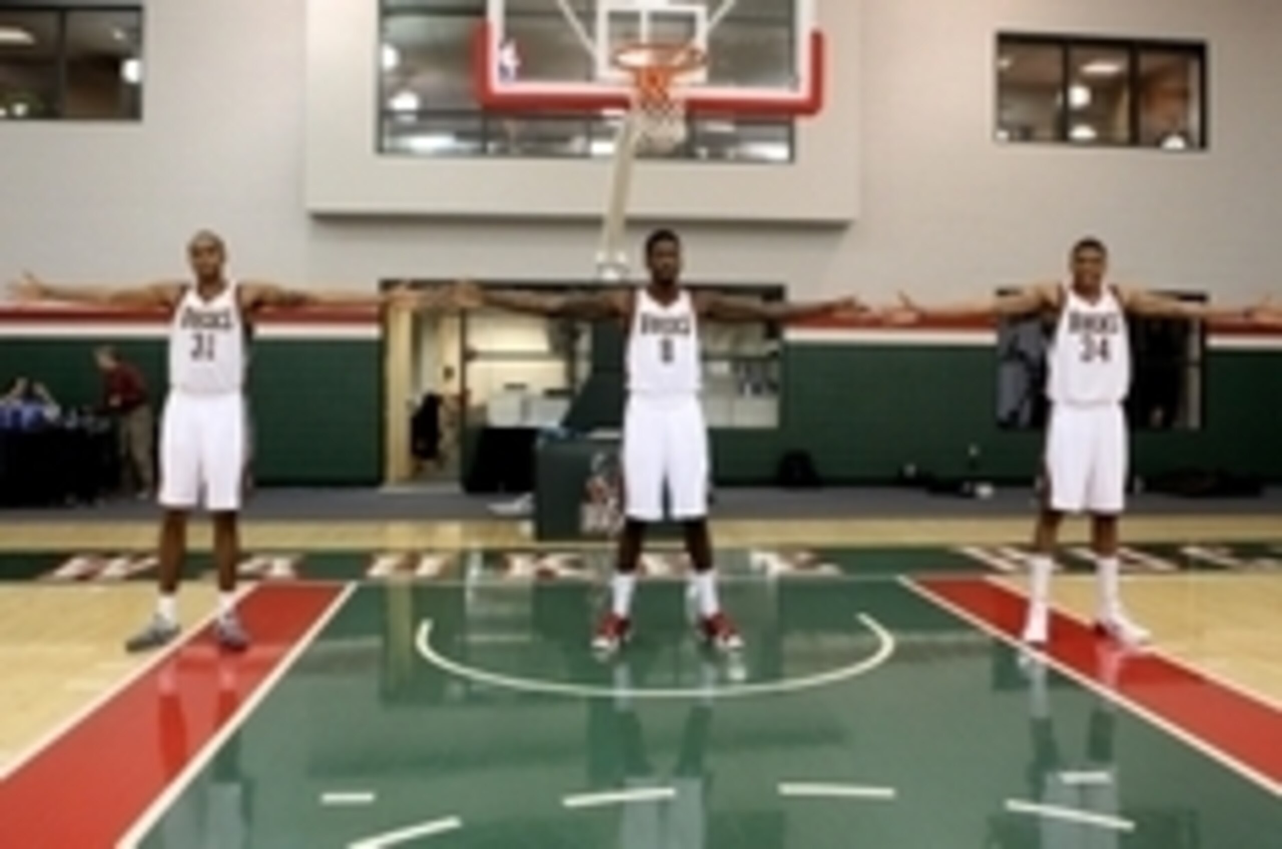 Sep 30, 2013; St. Francis, WI, USA; Arm lengths of three Milwaukee Bucks players from left John Henson (11), Larry Sanders (8), and Giannis Antetokounmpo (34) during Media Day at Milwaukee Bucks Training Center. Mandatory Credit: Mary Langenfeld-USA TODAY
