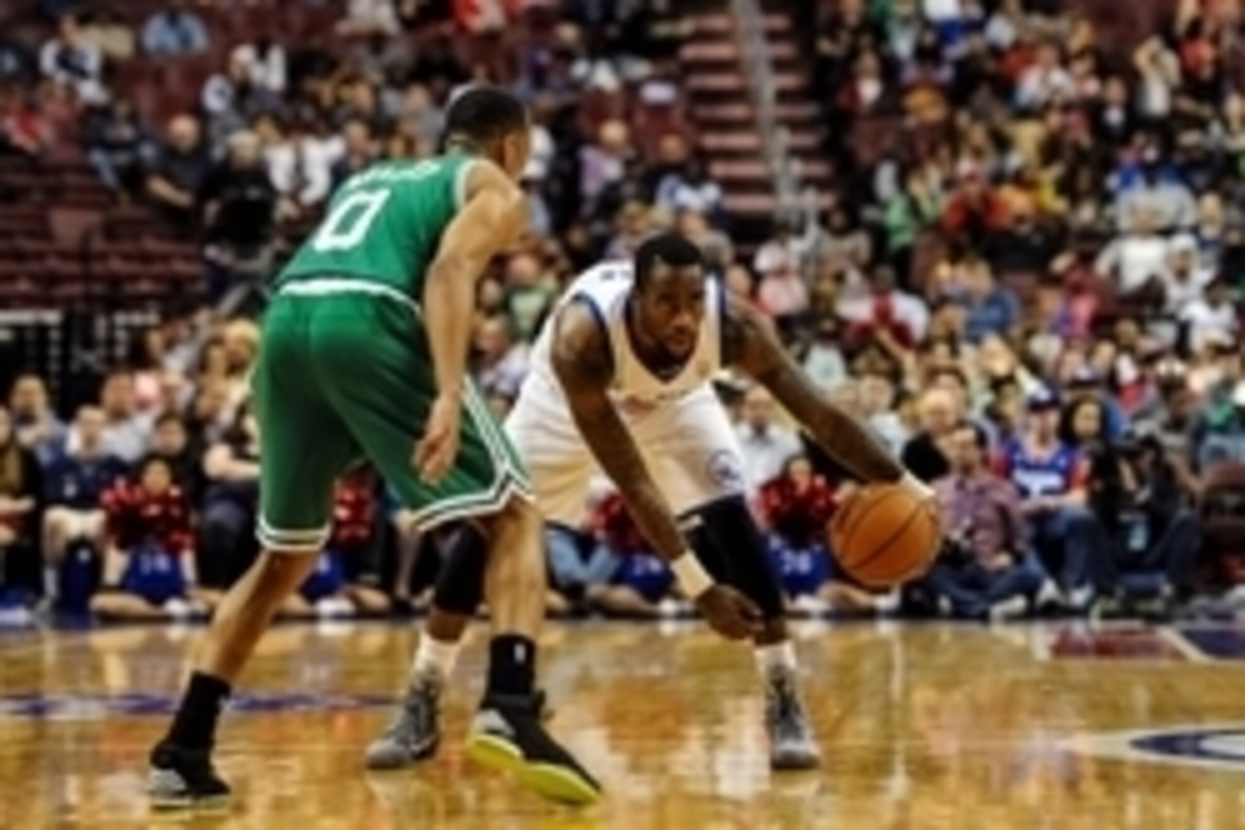 Apr 14, 2014; Philadelphia, PA, USA; Philadelphia 76ers guard Tony Wroten (8) looks to pass as Boston Celtics guard Avery Bradley (0) defends in the third quarter of the game at Wells Fargo Center. The Philadelphia 76ers won 113-108. Mandatory Credit: Joh