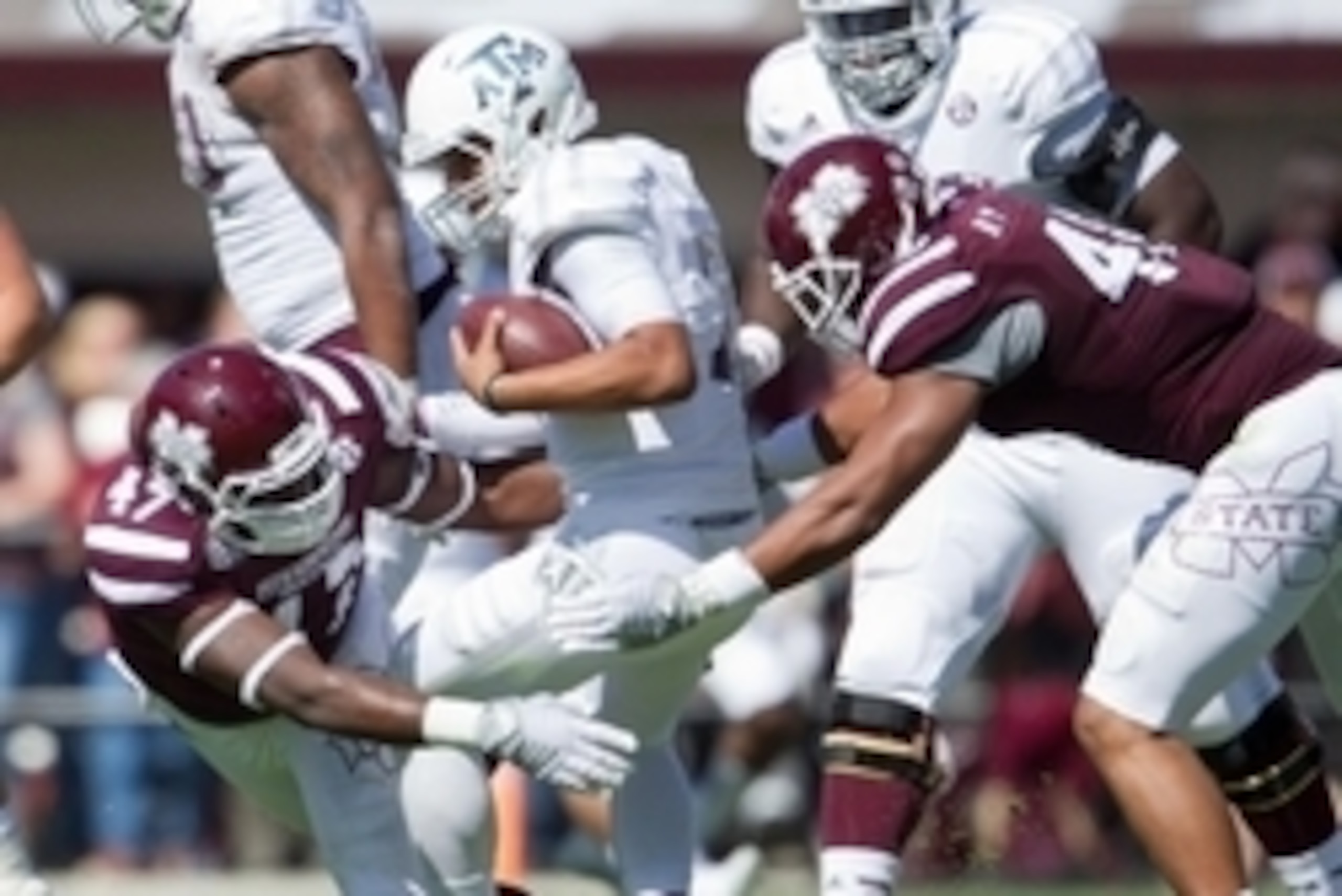 Oct 4, 2014; Starkville, MS, USA; Mississippi State Bulldogs defensive lineman A.J. Jefferson (47) and defensive lineman Ryan Brown (48) sack Texas A&M Aggies quarterback Kenny Hill (7) at Davis Wade Stadium. The Bulldogs defeated the Aggies 48-31. Mandat Oct 4, 2014; Starkville, MS, USA; Mississippi State Bulldogs defensive lineman A.J. Jefferson (47) and defensive lineman Ryan Brown (48) sack Texas A&M Aggies quarterback Kenny Hill (7) at Davis Wade Stadium. The Bulldogs defeated the Aggies 48-31. Mandat