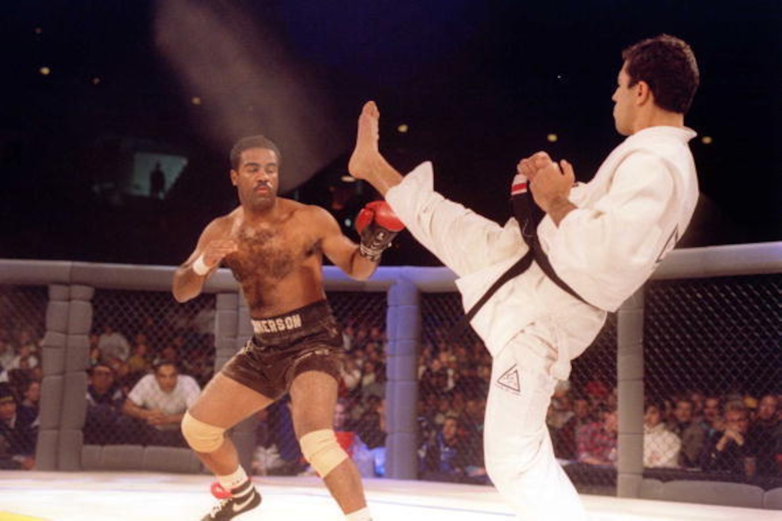 Jiu-Jitsu black belt Royce Gracie kicks at cruiserweight boxer Art Jimmerson during a 1st round match in the Ultimate Fighter Championships in Denver, Colorado. Gracie went on to win the match and eventually the championship. Mandatory Credit: Markus Boes