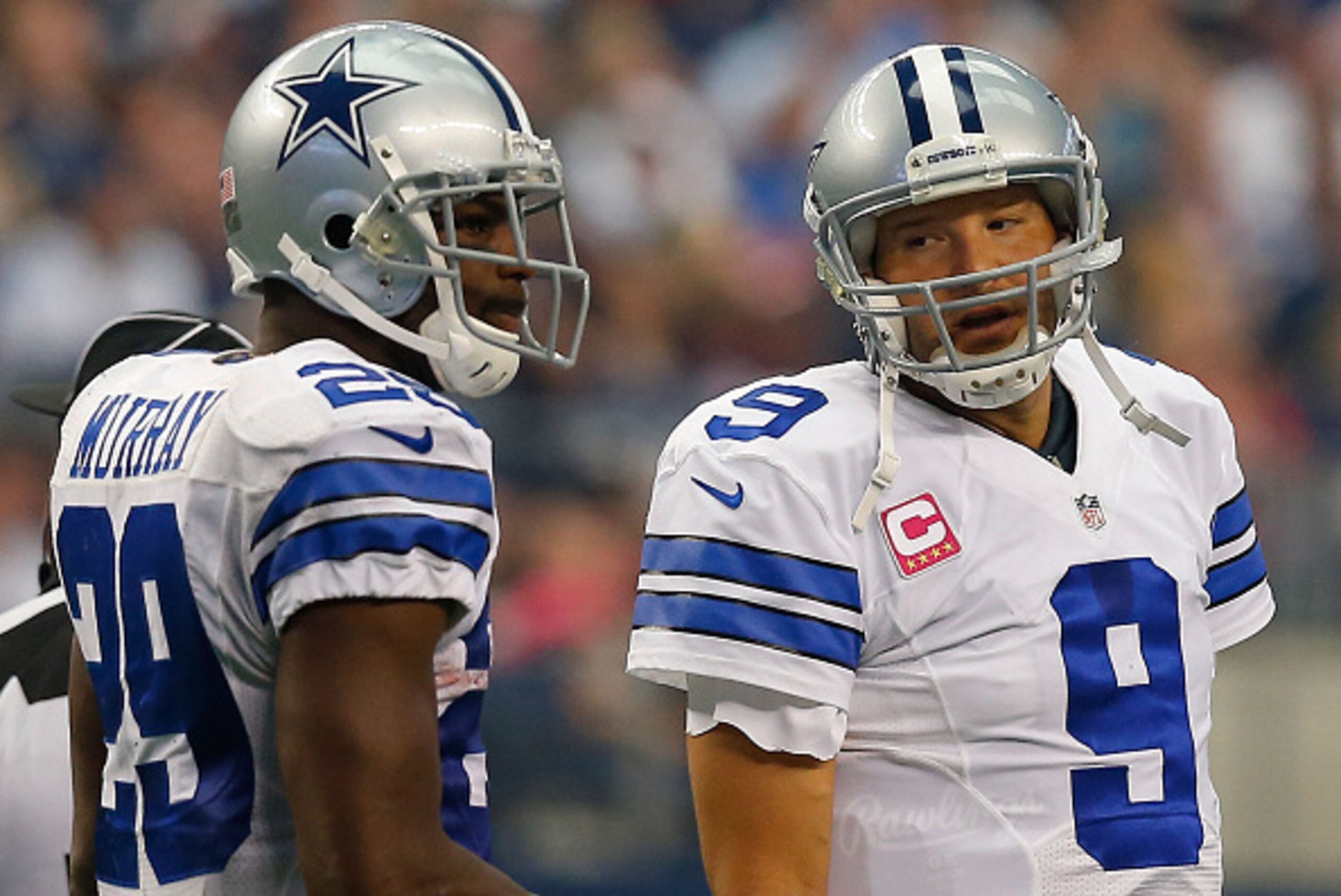 ARLINGTON, TX - OCTOBER 05:  Tony Romo #9 of the Dallas Cowboys talks to DeMarco Murray #29 of the Dallas Cowboys against the Houston Texans in the first half at AT&T Stadium on October 5, 2014 in Arlington, Texas.  (Photo by Tom Pennington/Getty Images)