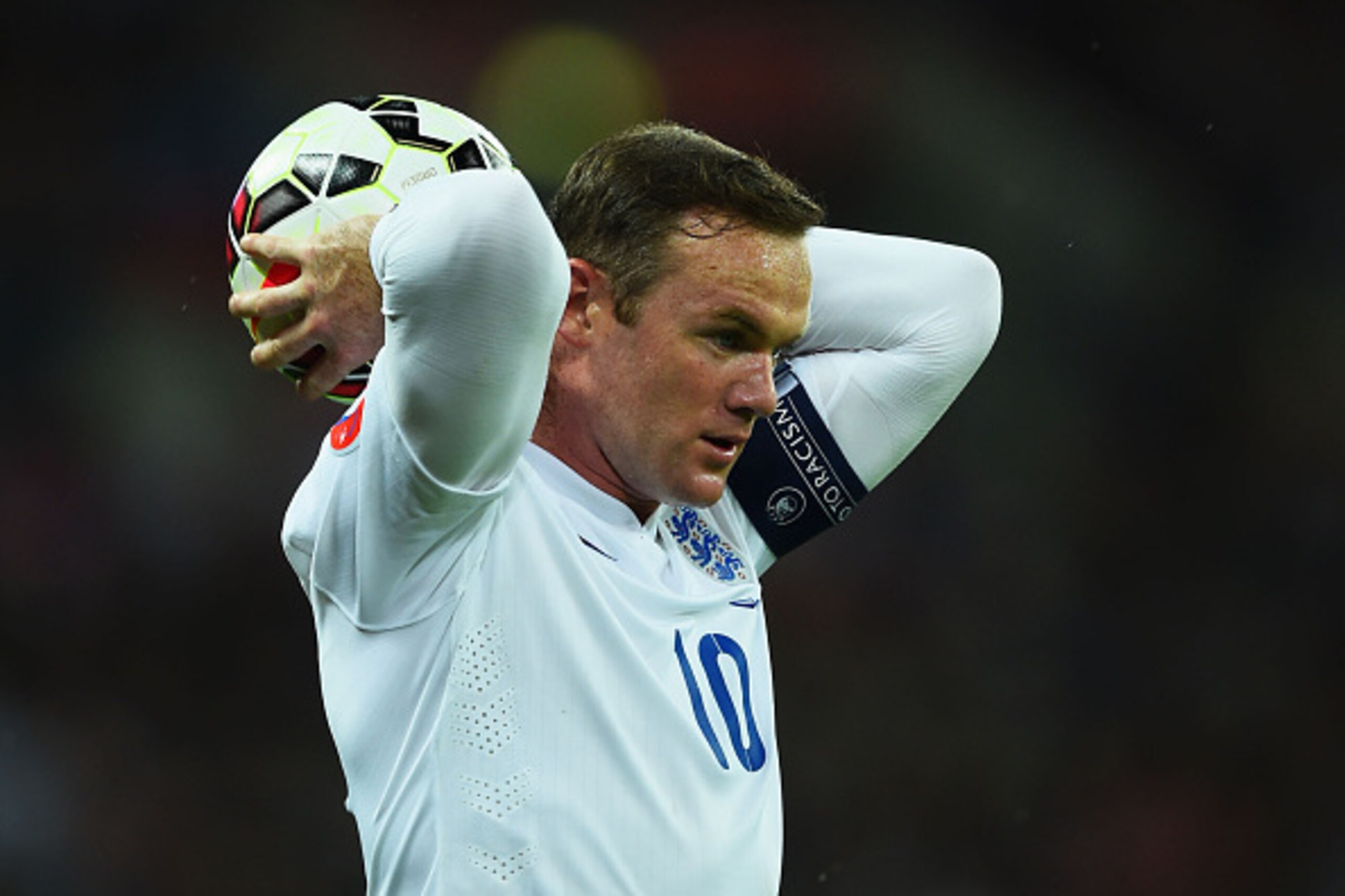 LONDON, ENGLAND - OCTOBER 09:  Wayne Rooney of England takes a throw in during the EURO 2016 Group E Qualifying match between England and San Marino at Wembley Stadium on October 9, 2014 in London, England.  (Photo by Laurence Griffiths/Getty Images)