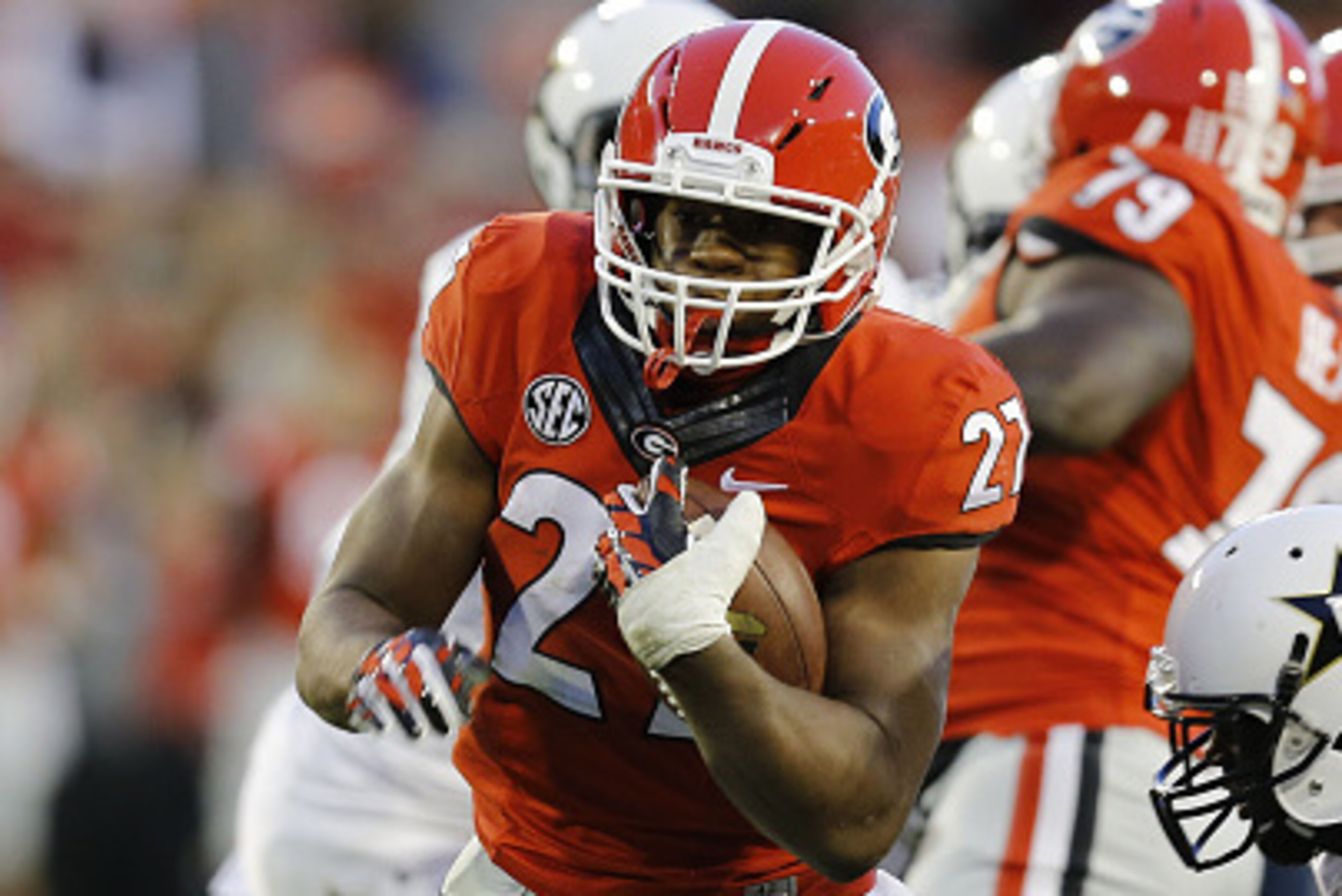 ATHENS, GA - OCTOBER 04:  Running back Nick Chubb #27 of the Georgia Bulldogs runs for a fourth-quarter touchdown during the game against the Vanderbilt Commodores at Sanford Stadium on October 4, 2014 in Athens, Georgia.  (Photo by Mike Zarrilli/Getty Im