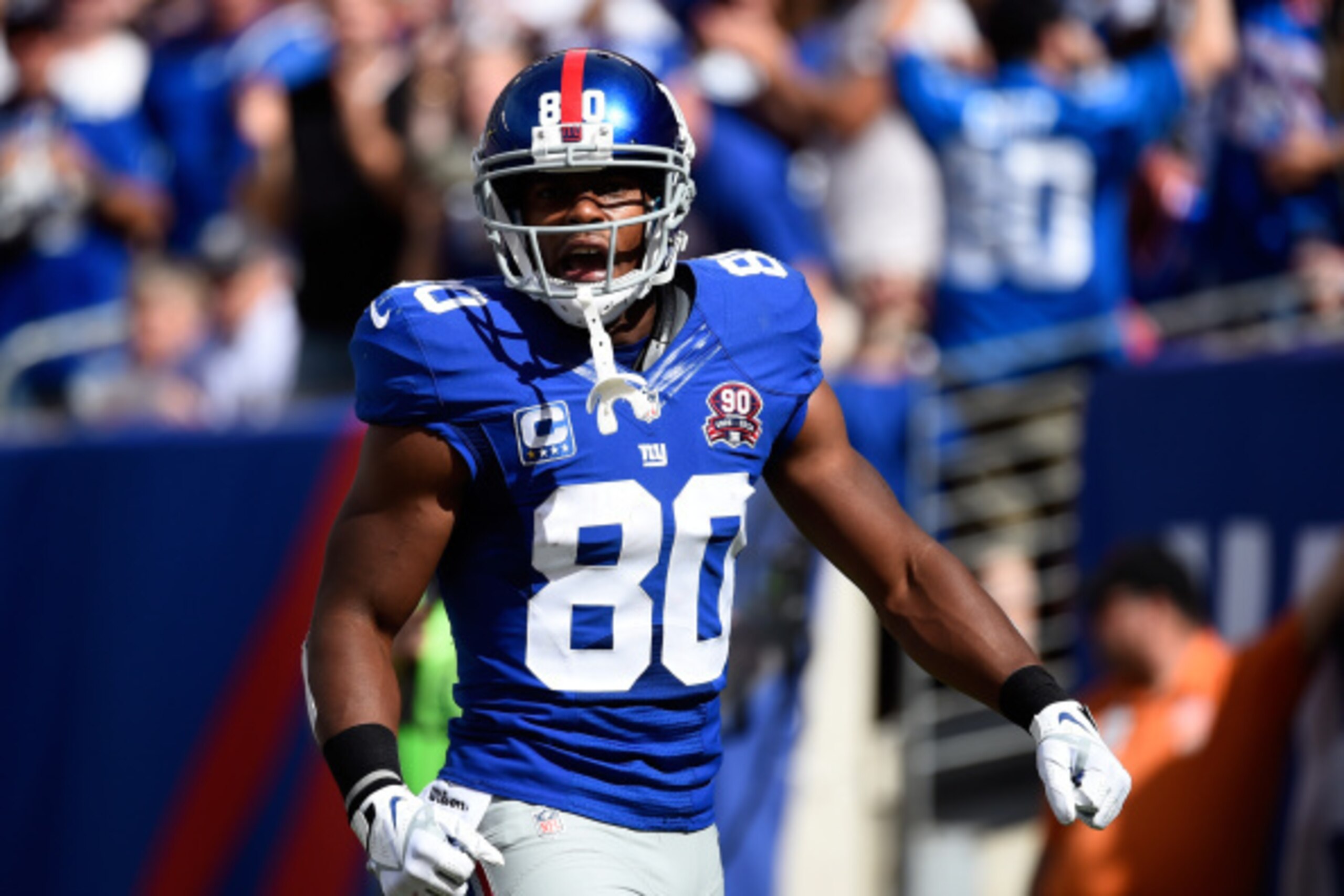 EAST RUTHERFORD, NJ - SEPTEMBER 14:  Wide receiver Victor Cruz #80 of the New York Giants reacts to a pass interference call against cornerback Patrick Peterson #21 of the Arizona Cardinals during a game at MetLife Stadium on September 14, 2014 in East Ru