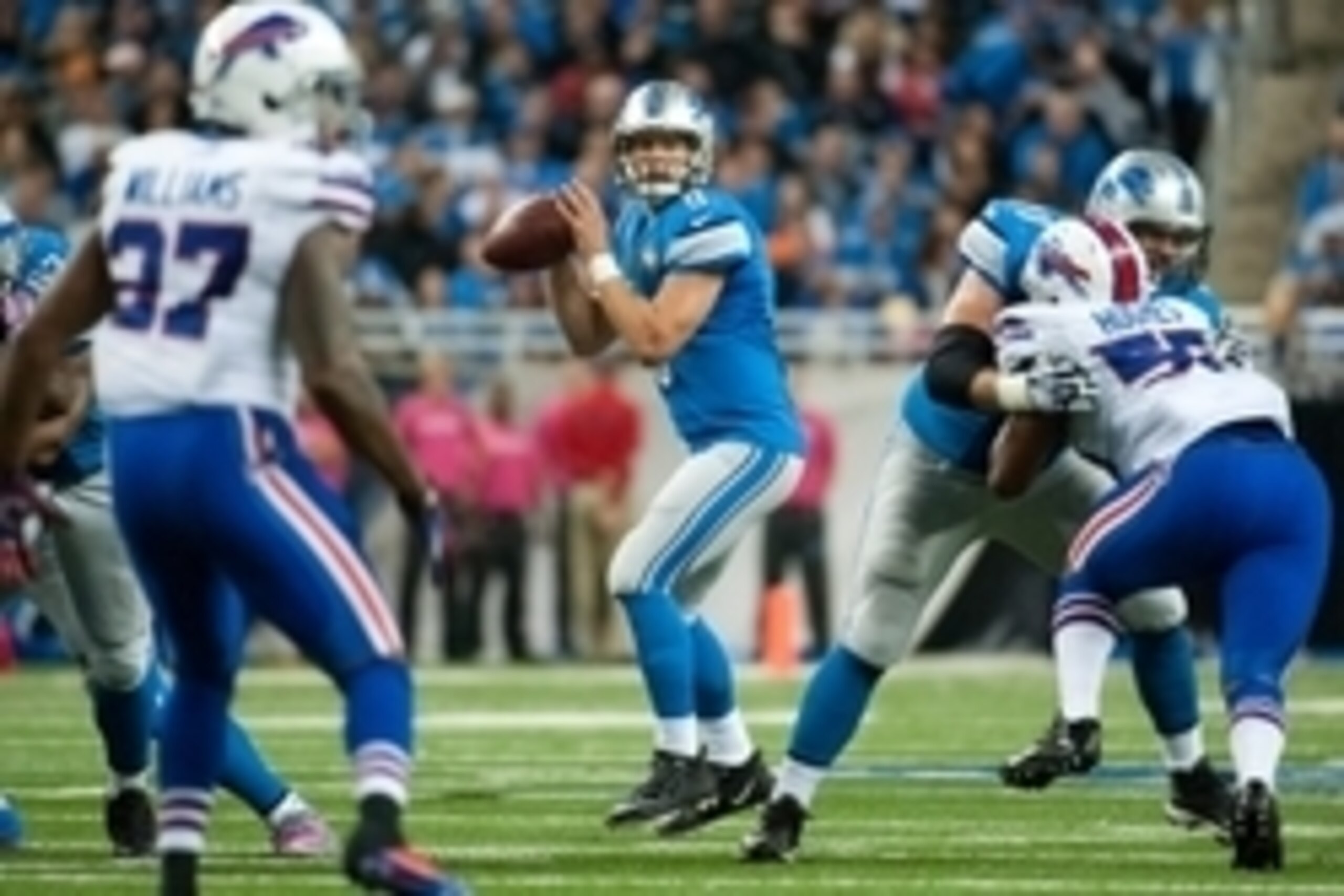 Oct 5, 2014; Detroit, MI, USA; Detroit Lions quarterback Matthew Stafford (9) drops back to pass during the third quarter against the Buffalo Bills at Ford Field. Mandatory Credit: Tim Fuller-USA TODAY Sports