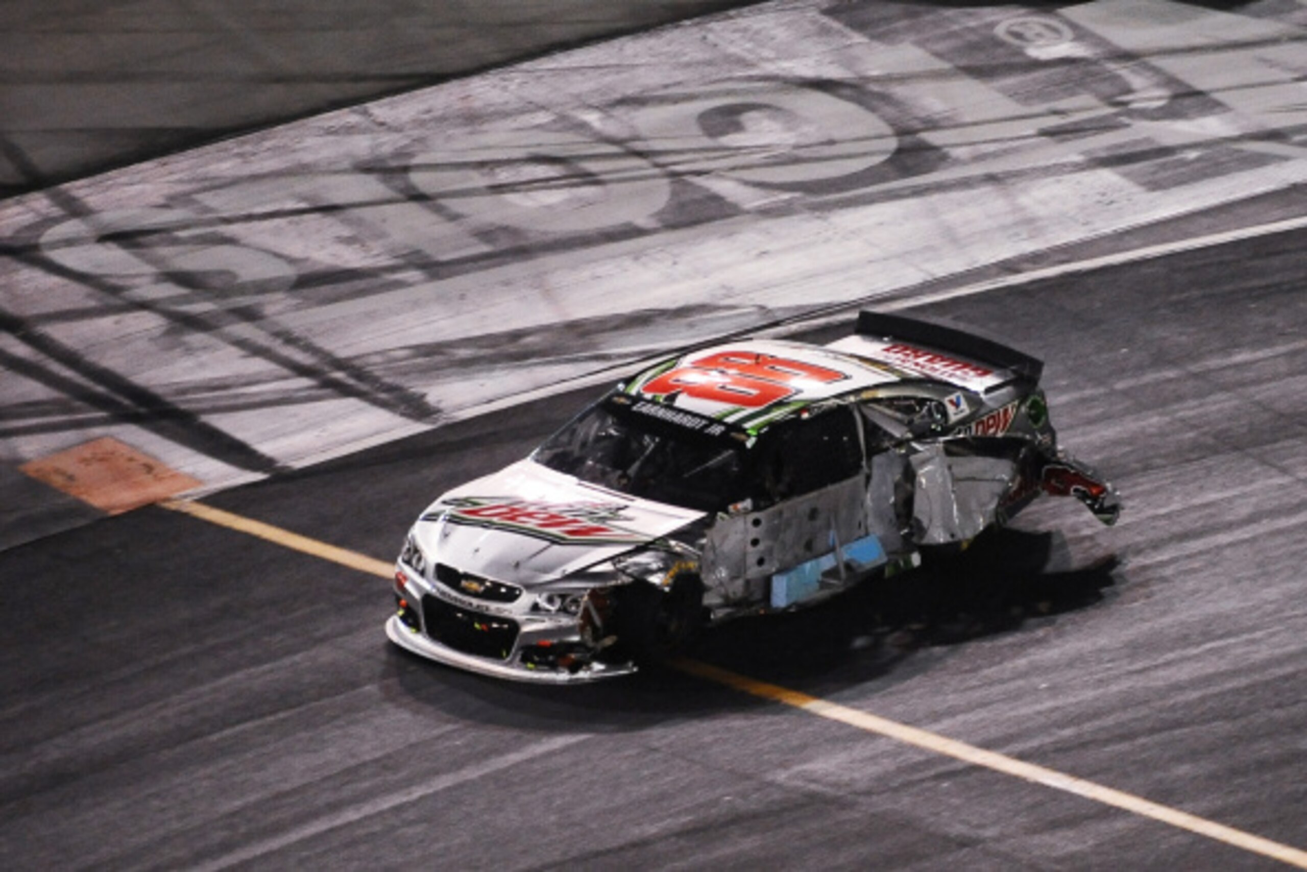 BRISTOL, TN - AUGUST 23: Dale Earnhardt Jr., driver of the #88 Diet Mountain Dew Chevrolet, is seen after an incident during the NASCAR Sprint Cup Series Irwin Tools Night Race at Bristol Motor Speedway on August 23, 2014 in Bristol, Tennessee.  (Photo by