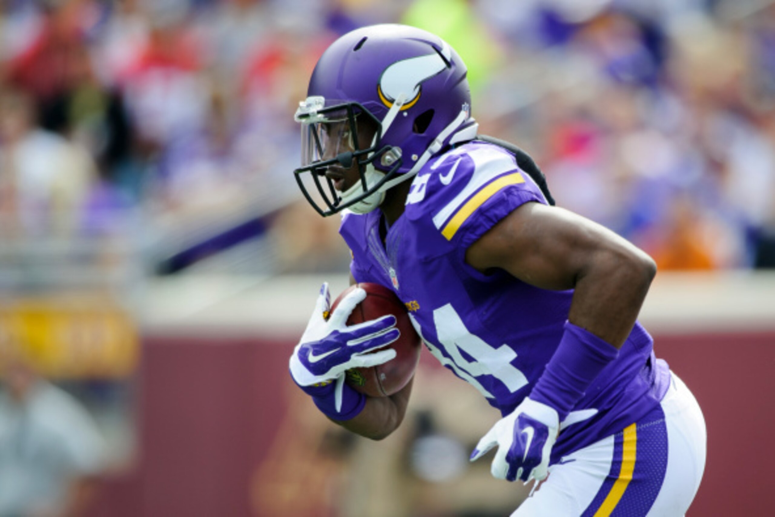 MINNEAPOLIS, MN - SEPTEMBER 14: Cordarrelle Patterson #84 of the Minnesota Vikings returns a punt by the New England Patriots during the game on September 14, 2014 at TCF Bank Stadium in Minneapolis, Minnesota. The Patriots defeated the Vikings 30-7. (Pho