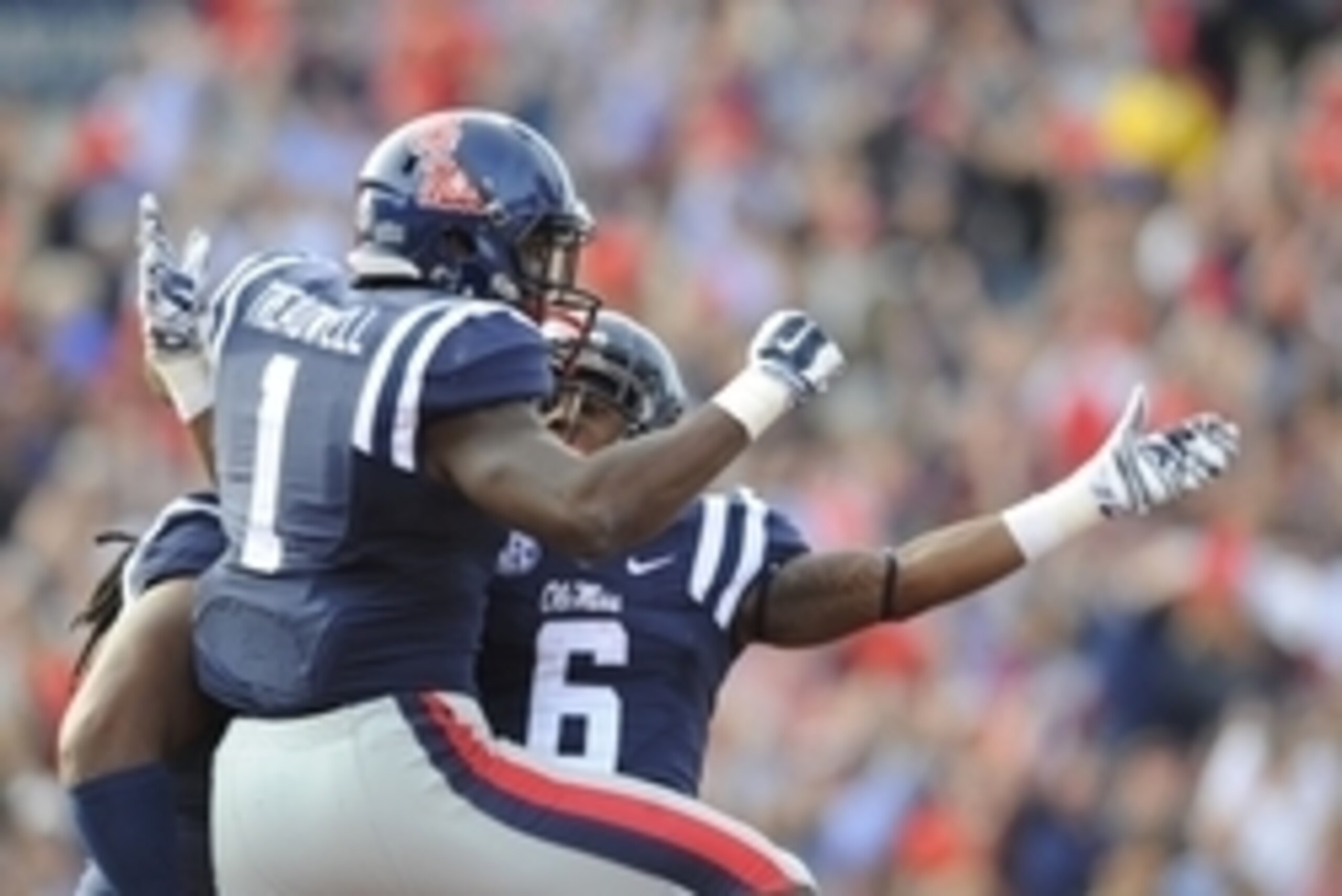 Oct 4, 2014; Oxford, MS, USA; Mississippi Rebels receiver Laquon Treadwell (1) celebrates with teammates after scoring during the second half against Alabama Crimson Tide at Vaught-Hemingway Stadium. Mandatory Credit: Christopher Hanewinckel-USA TODAY Spo