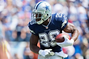 NASHVILLE, TN - SEPTEMBER 14:  DeMarco Murray #29 of the Dallas Cowboys runs the ball against the Tennessee Titans  at LP Field on September 14, 2014 in Nashville, Tennessee.  (Photo by Wesley Hitt/Getty Images)