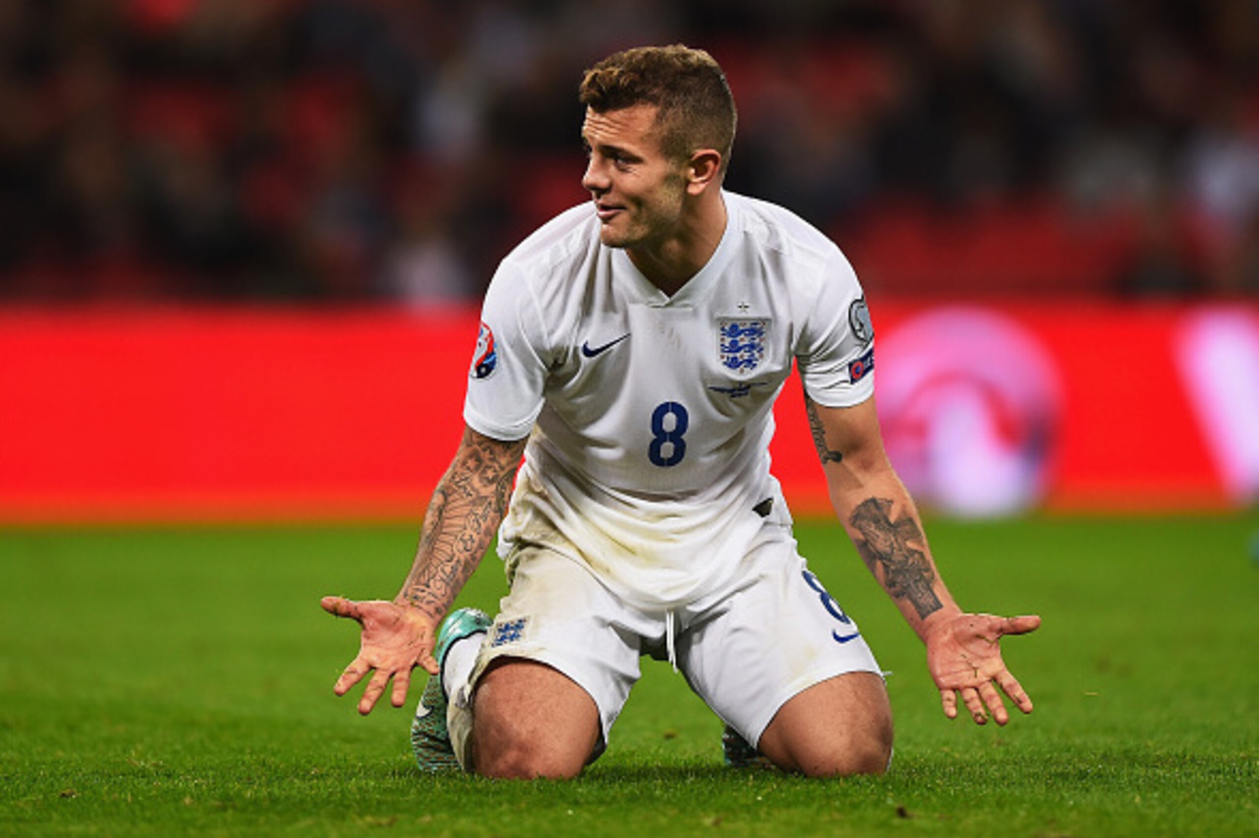 LONDON, ENGLAND - OCTOBER 09: Jack Wilshere of England reacts during the EURO 2016 Group E Qualifying match between England and San Marino at Wembley Stadium on October 9, 2014 in London, England.  (Photo by Laurence Griffiths/Getty Images)