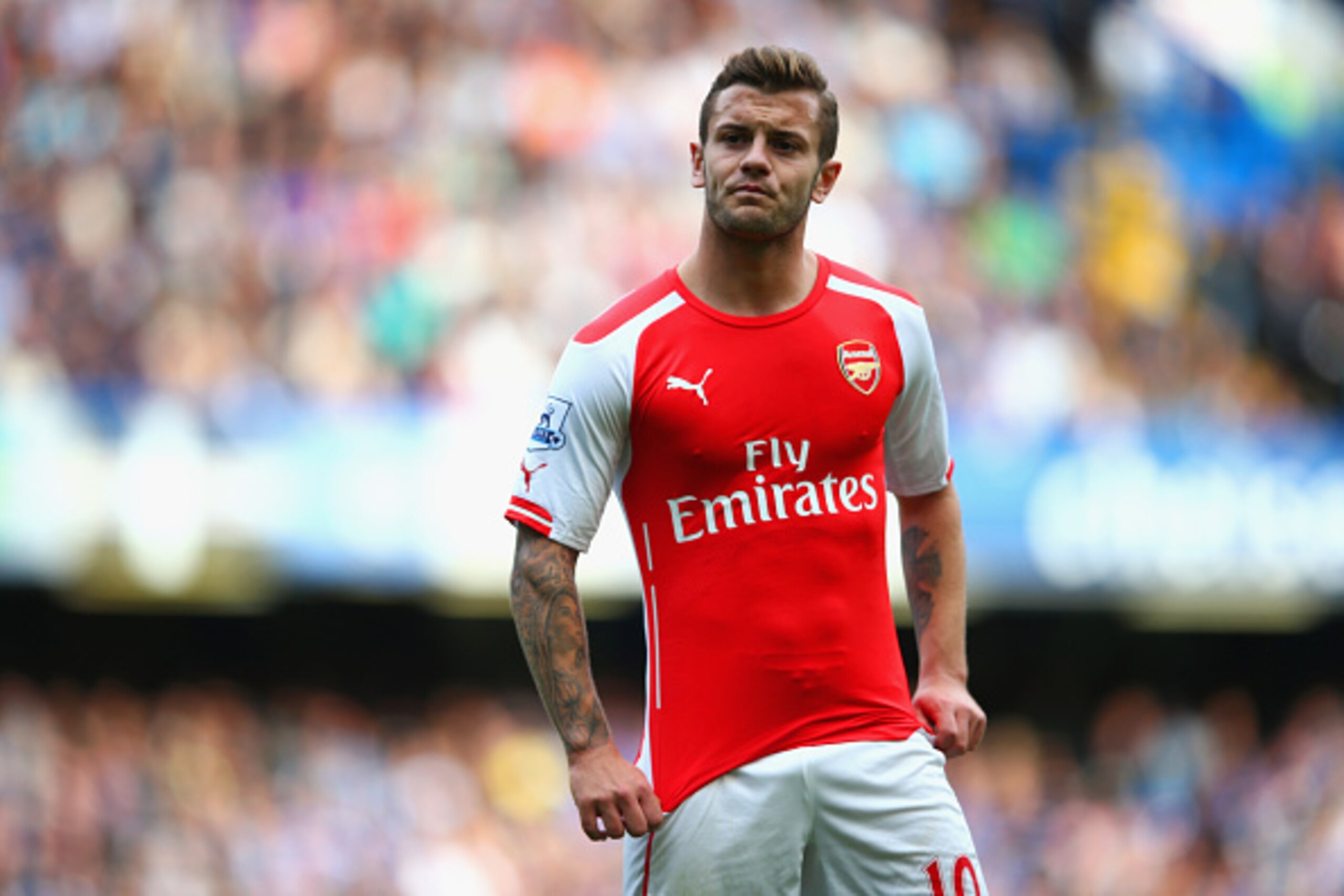 LONDON, ENGLAND - OCTOBER 05:  Jack Wilshere of Arsenal looks on during the Barclays Premier League match between Chelsea and Arsenal at Stamford Bridge on October 4, 2014 in London, England.  (Photo by Paul Gilham/Getty Images)