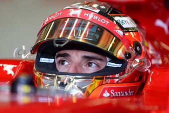 NORTHAMPTON, ENGLAND - JULY 09:  Jules Bianchi of France sits in a Ferrari in the garage during day two of testing at Silverstone Circuit on July 9, 2014 in Northampton, England.  (Photo by Mark Thompson/Getty Images)