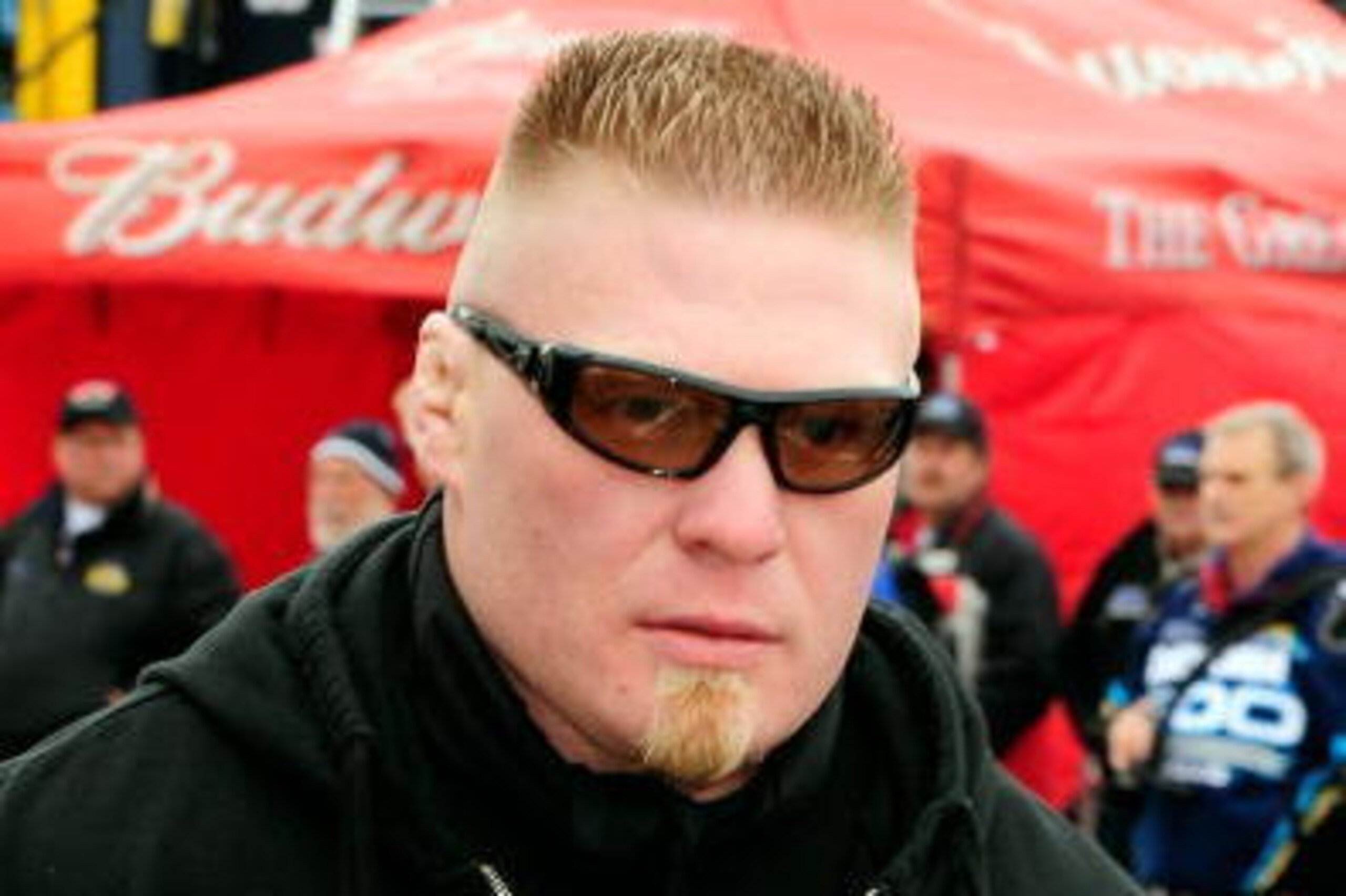 DAYTONA BEACH, FL - FEBRUARY 13:  MMA fighter Brock Lesnar walks in the garage area during practice for the Daytona 500 at Daytona International Speedway on February 13, 2010 in Daytona Beach, Florida.  (Photo by Sam Greenwood/Getty Images for NASCAR)