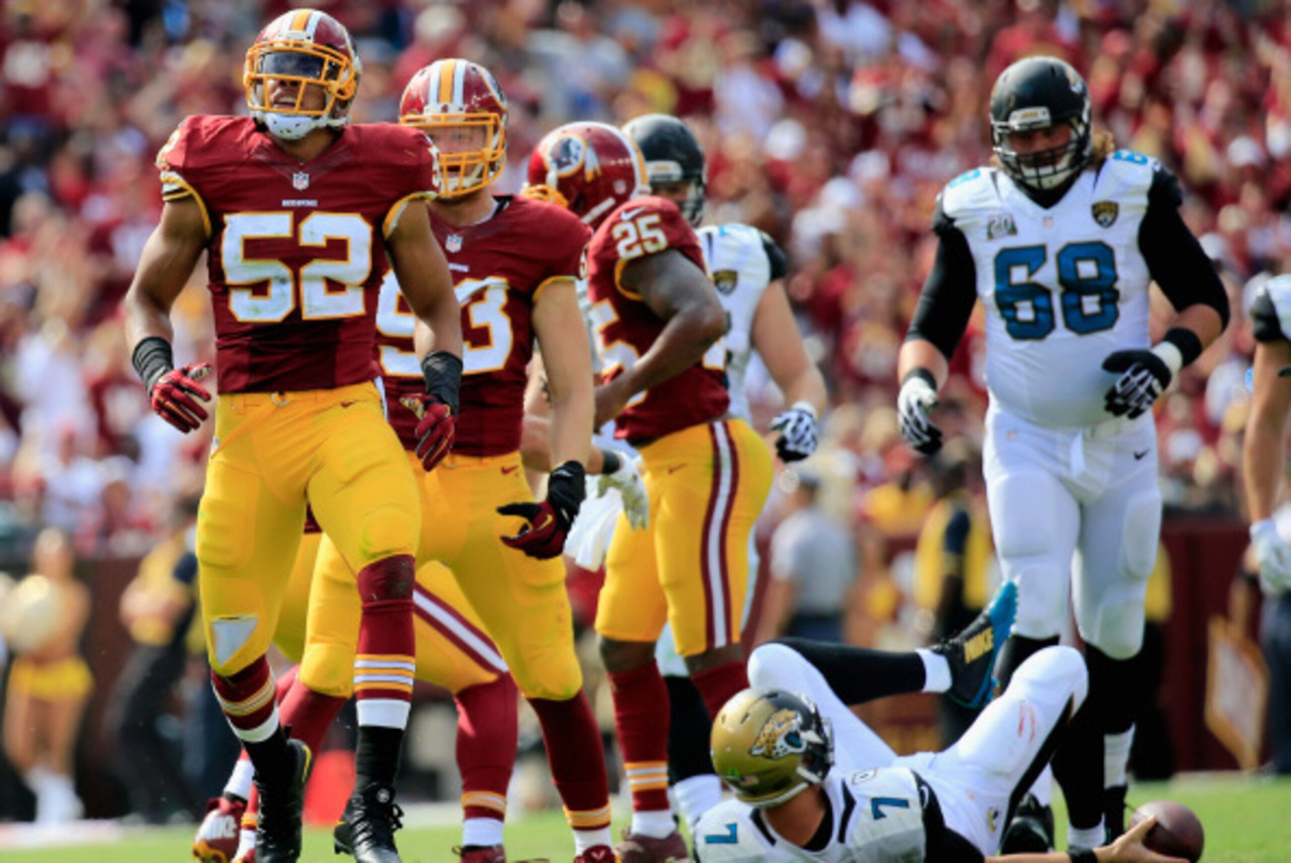 LANDOVER, MD - SEPTEMBER 14: Inside linebacker Keenan Robinson #52 of the Washington Redskins reacts during the second half of a game against the Jacksonville Jaguars at FedExField on September 14, 2014 in Landover, Maryland.  (Photo by Rob Carr/Getty Ima