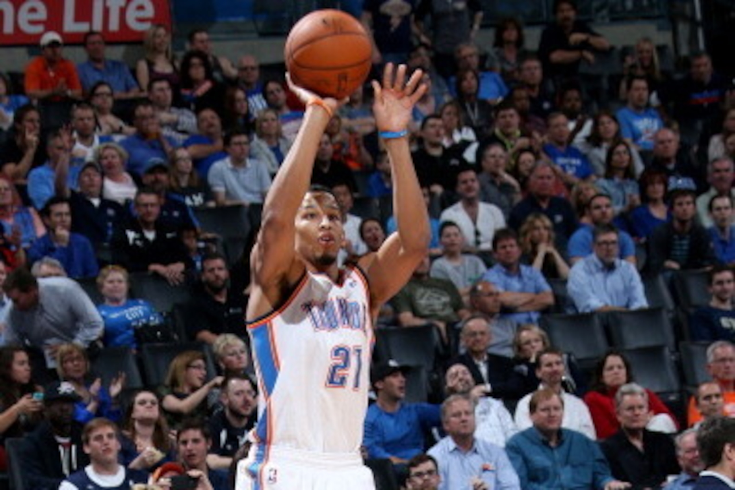 OKLAHOMA CITY, OK - APRIL 03: Andre Roberson #21 of the Oklahoma City Thunder shoots against the San Antonio Spurs  on April 03, 2014 at the Chesapeake Energy Arena in Oklahoma City, Oklahoma. NOTE TO USER: User expressly acknowledges and agrees that, by 