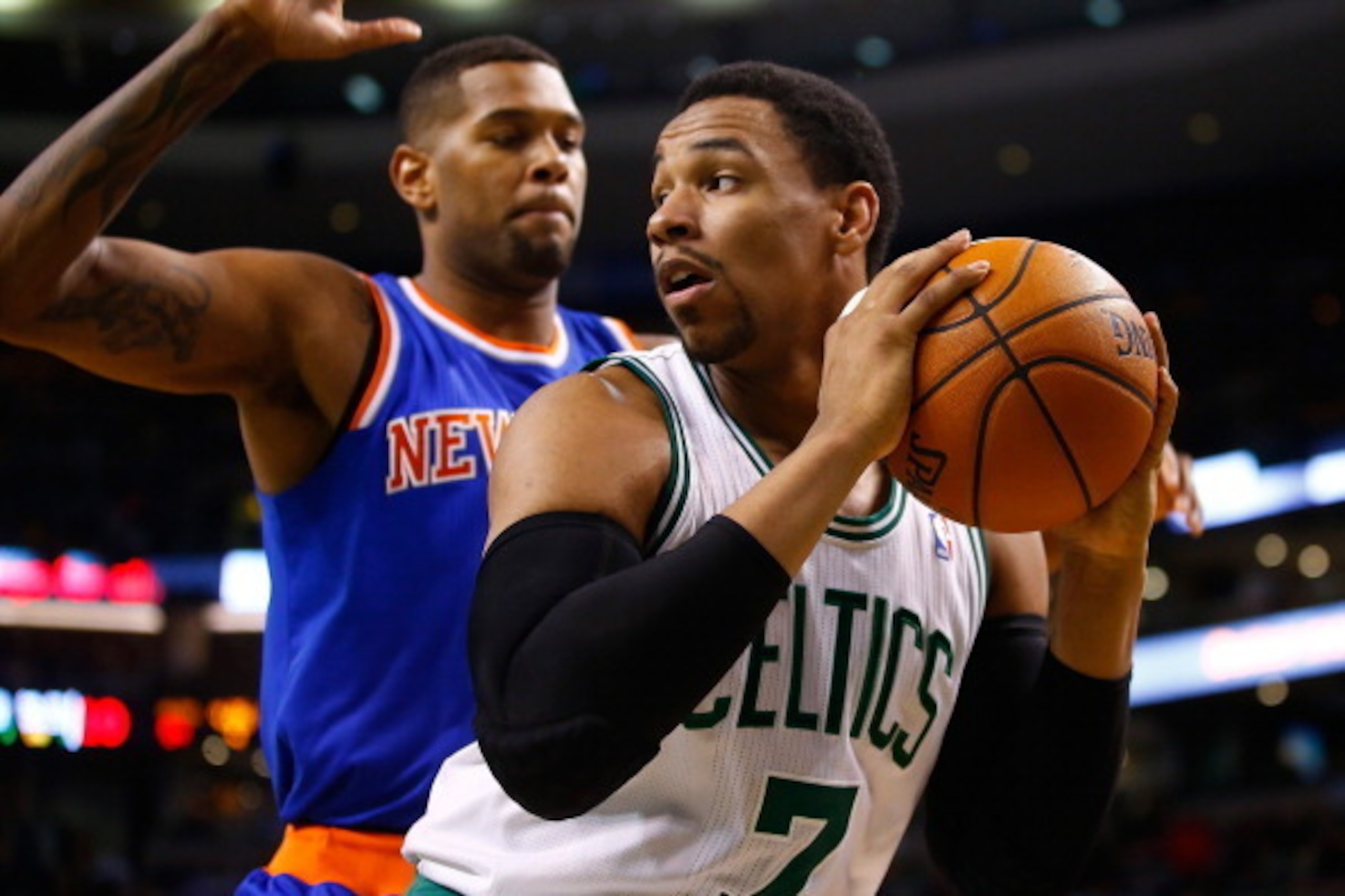 BOSTON, MA - MARCH 12: Jared Sullinger #7 of the Boston Celtics is defended by Jeremy Tyler #4 of the New York Knicks in the second half during the game at TD Garden on March 12, 2014 in Boston, Massachusetts. NOTE TO USER: User expressly acknowledges and