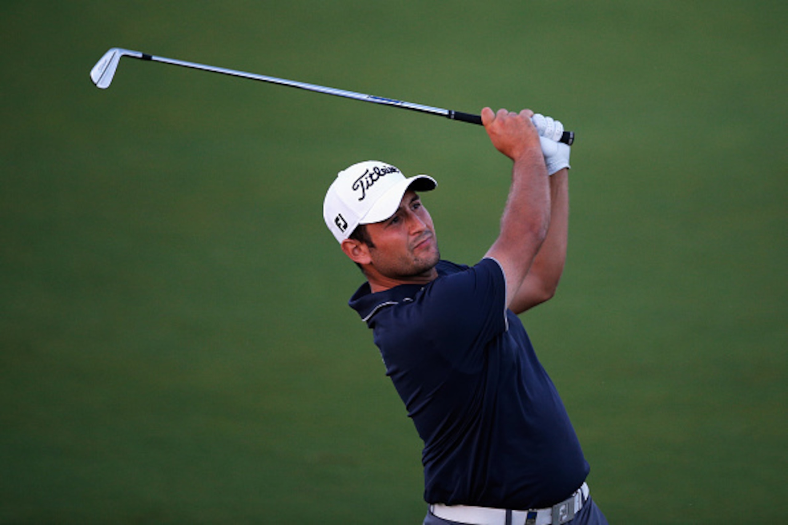 ALBUFEIRA, PORTUGAL - OCTOBER 10:  Alexander Levy of France hits his second shot on the 7th hole during Day 2 of the Portugal Masters held at the Oceanico Victoria Golf Course on October 10, 2014 in Albufeira, Portugal.  (Photo by Dean Mouhtaropoulos/Gett