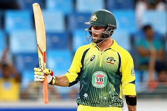 DUBAI, UNITED ARAB EMIRATES - OCTOBER 10: Glenn Maxwell of Australia celebrates after reaching his half century during the second match of the one day international series between Australia and  Pakistan at Dubai Sports City Cricket Stadium on October 10,