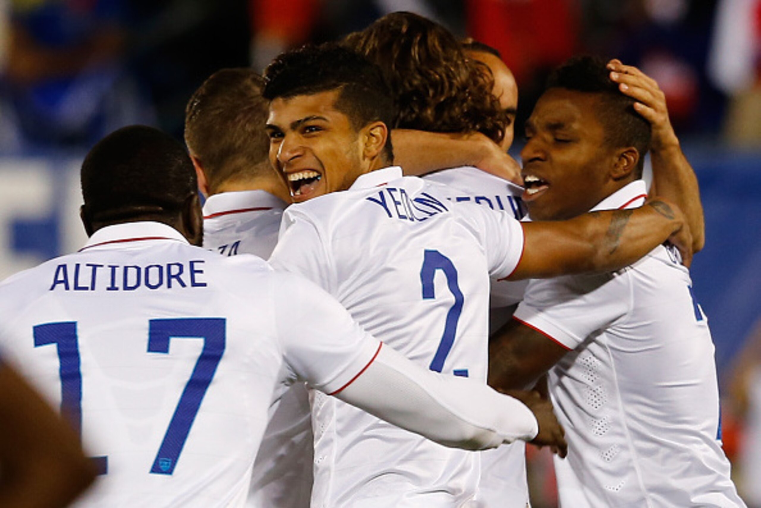 EAST HARTFORD, CT- OCTOBER 10: DeAndre Yedlin #2 of the United States celebrates a goal by Mix Diskerud #8 against Ecuador in the first half during an international friendly with Ecuador at Rentschler Field on October 10, 2014 in East Hartford, Connecticu