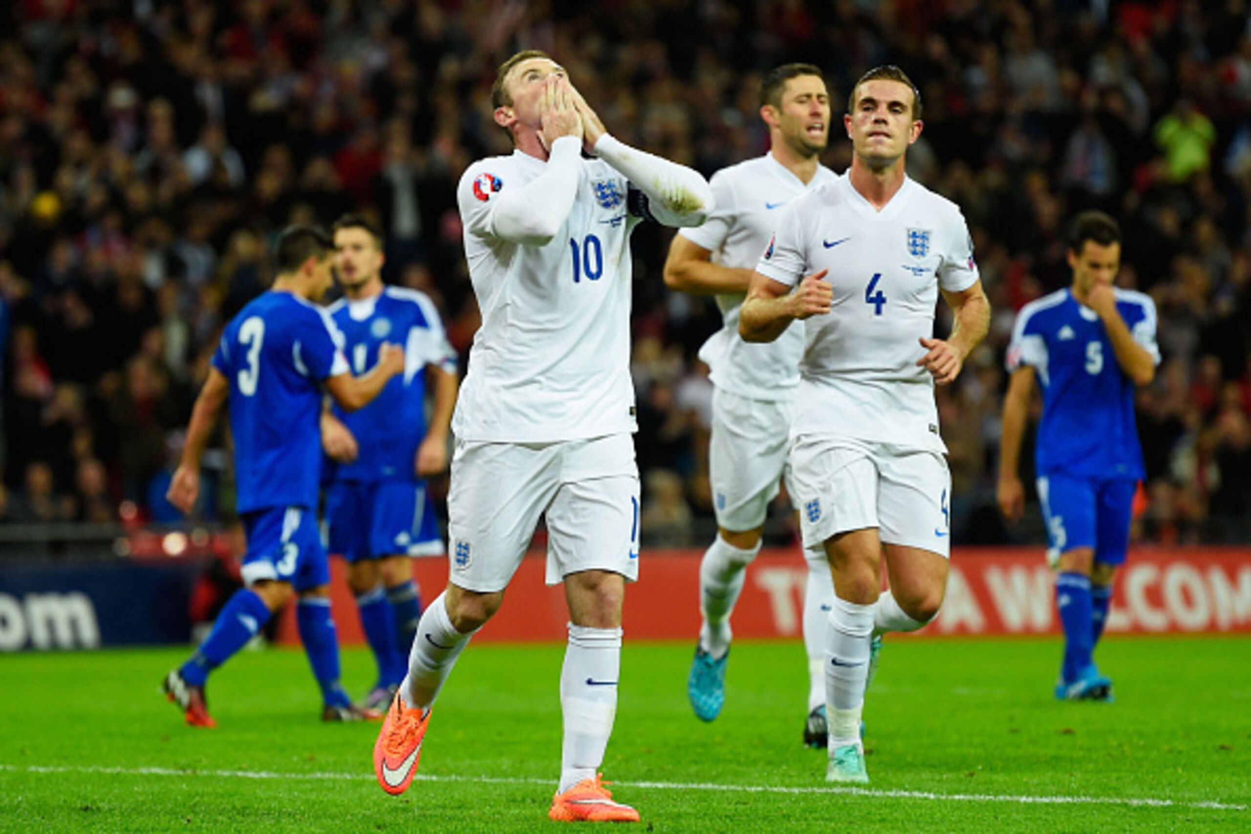 LONDON, ENGLAND - OCTOBER 09:  Wayne Rooney of England (10) celebrates as he scores their second goal from the penalty spot during the EURO 2016 Group E Qualifying match between England and San Marino at Wembley Stadium on October 9, 2014 in London, Engla
