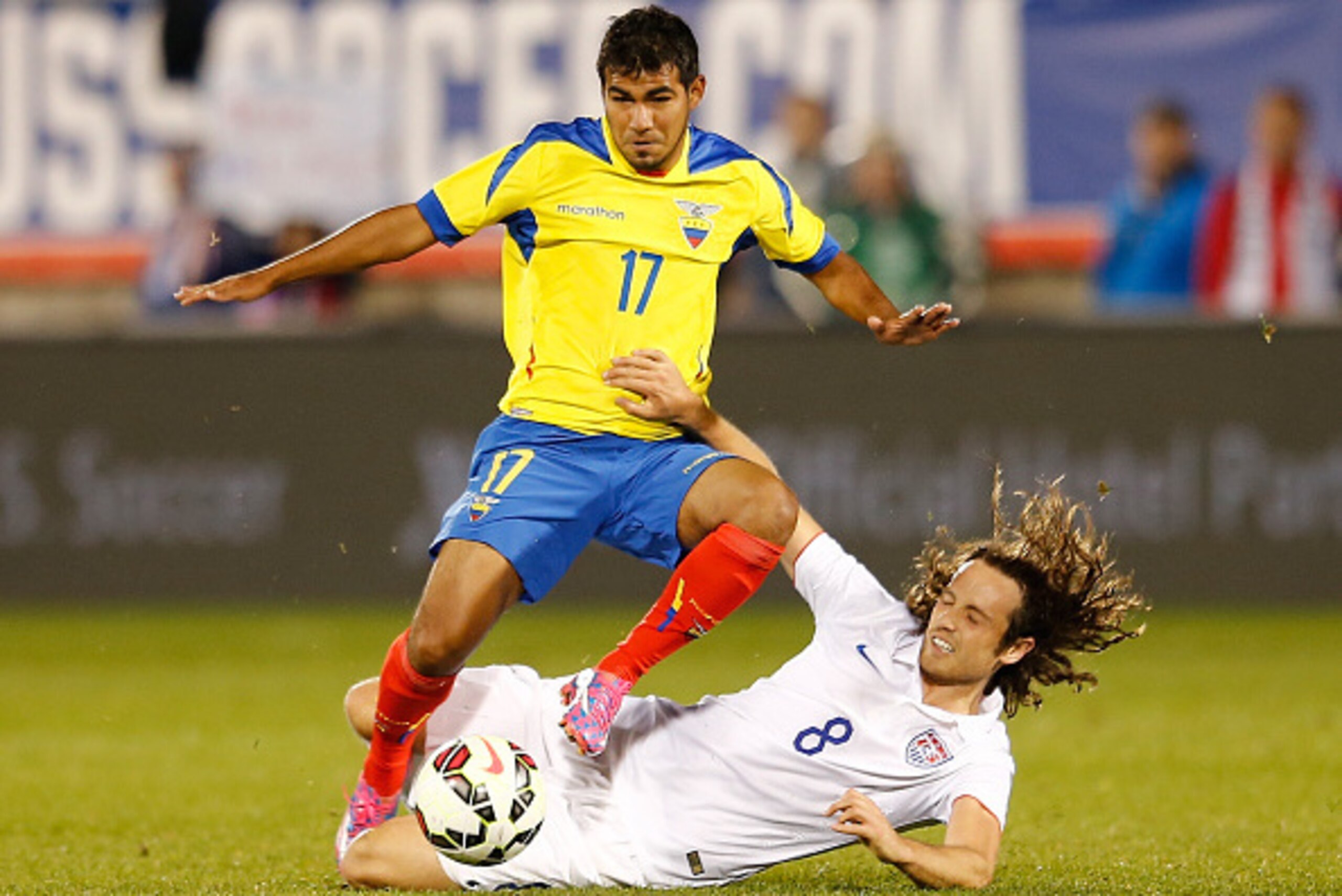 EAST HARTFORD, CT- OCTOBER 10:  Junior Sornoza #17 Ecuador battles Mix Diskerud #8 of the United States for the ball in the second half during an international friendly at Rentschler Field on October 10, 2014 in East Hartford, Connecticut. (Photo by Jim R