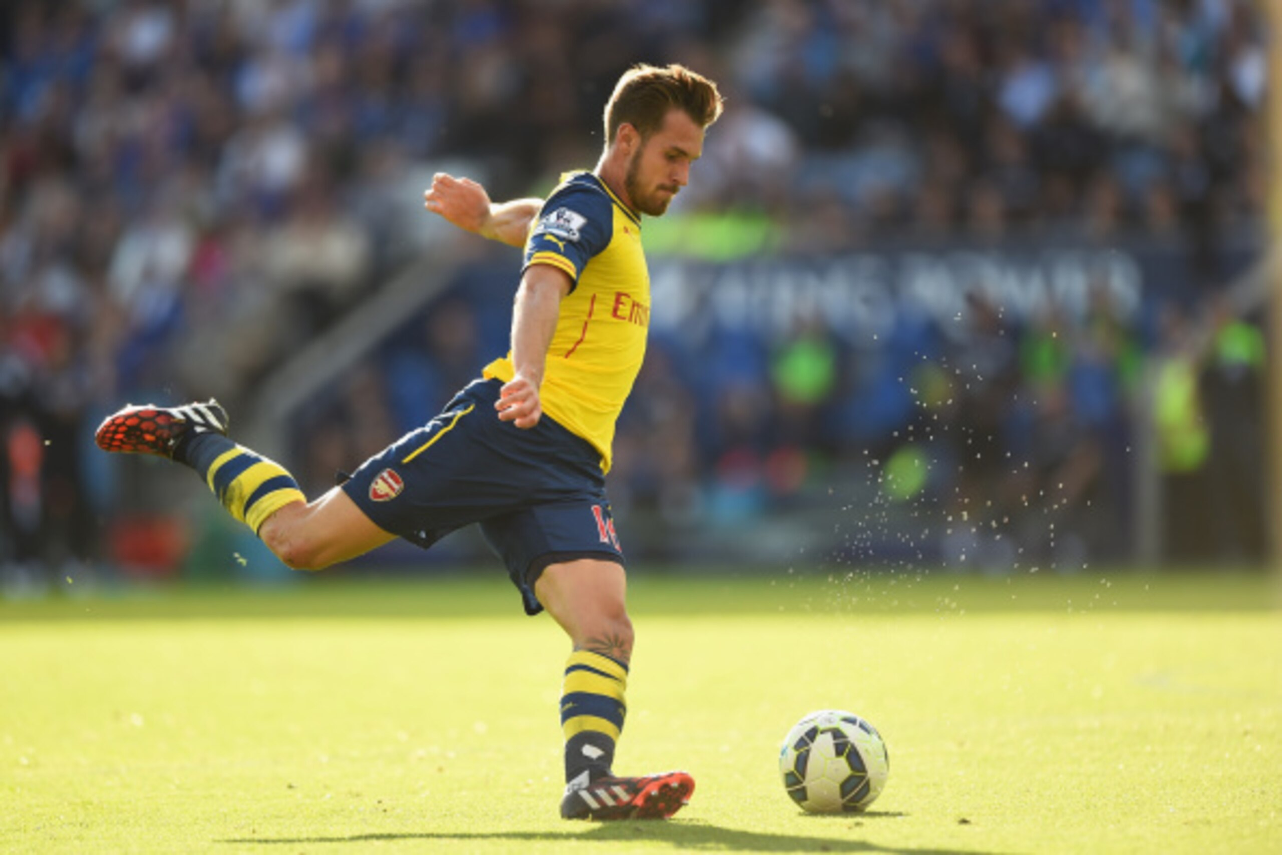 LEICESTER, ENGLAND - AUGUST 31: Aaron Ramsey of Arsenal in action during the Barclays Premier League match between Leicester City and Arsenal at The King Power Stadium on August 31, 2014 in Leicester, England. (Photo by Laurence Griffiths/Getty Images) LEICESTER, ENGLAND - AUGUST 31: Aaron Ramsey of Arsenal in action during the Barclays Premier League match between Leicester City and Arsenal at The King Power Stadium on August 31, 2014 in Leicester, England. (Photo by Laurence Griffiths/Getty Images)
