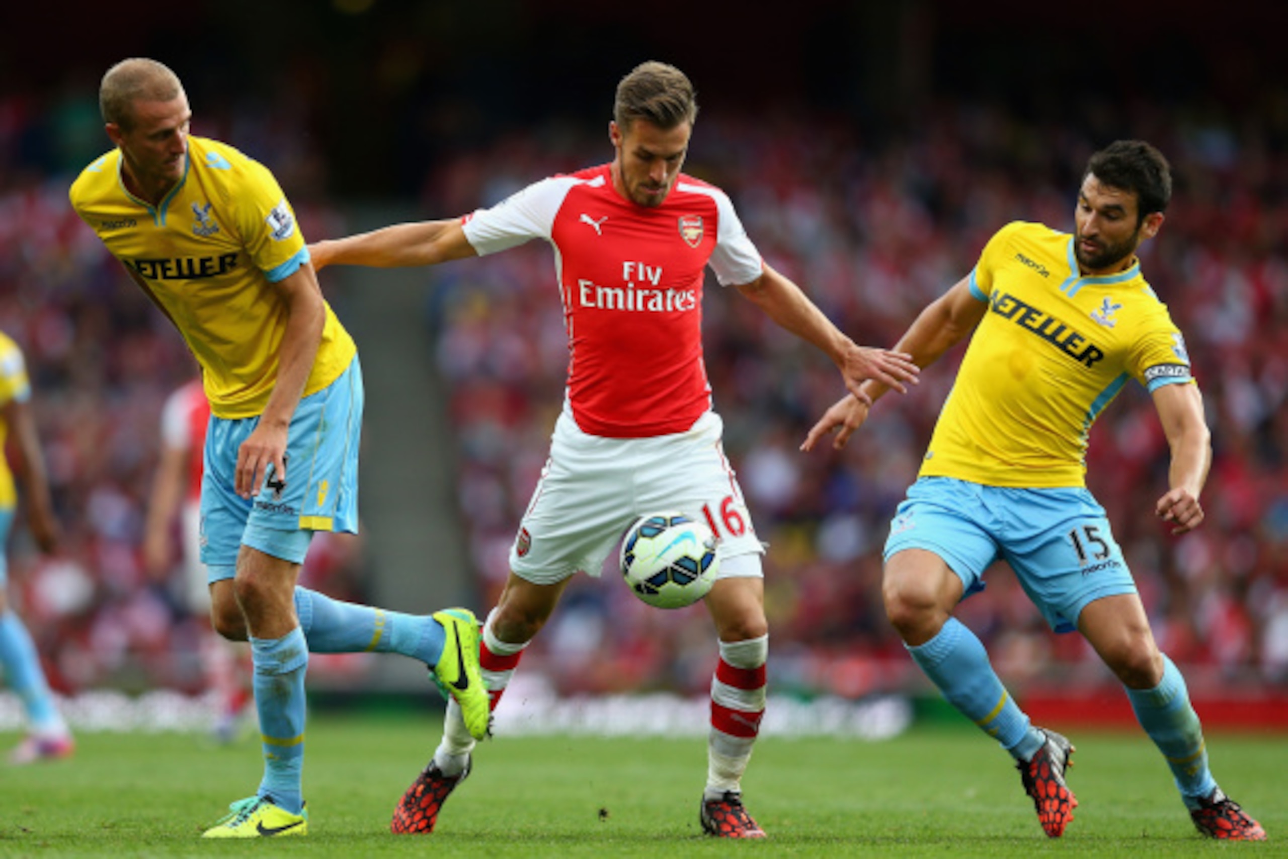 LONDON, ENGLAND - AUGUST 16: Aaron Ramsey of Arsenal in action during the Barclays Premier League match between Arsenal and Crystal Palace at Emirates Stadium on August 16, 2014 in London, England. (Photo by Clive Mason/Getty Images) LONDON, ENGLAND - AUGUST 16: Aaron Ramsey of Arsenal in action during the Barclays Premier League match between Arsenal and Crystal Palace at Emirates Stadium on August 16, 2014 in London, England. (Photo by Clive Mason/Getty Images)