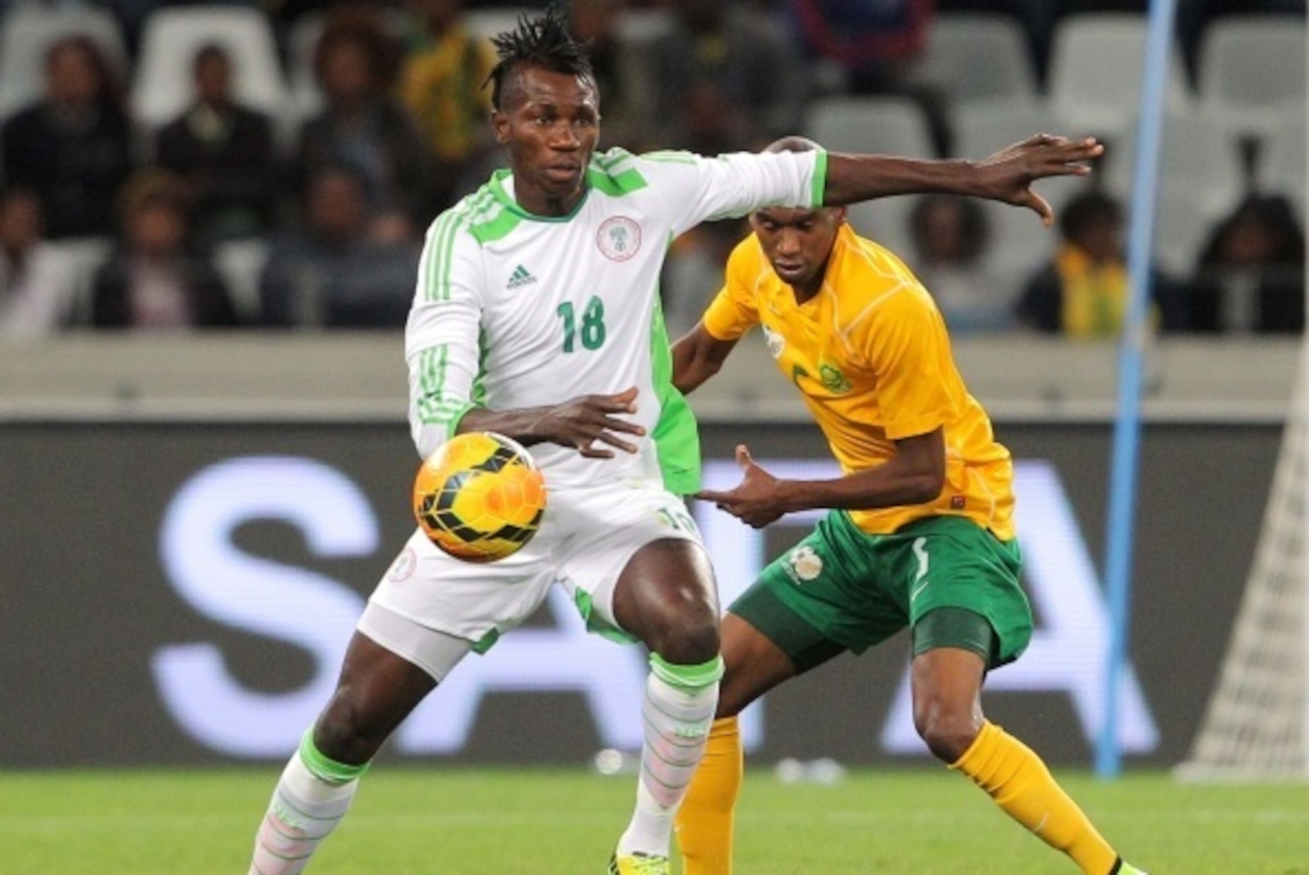 CAPE TOWN, SOUTH AFRICA - SEPTEMBER 10: Ighodaro Osaguona of Nigeria during the Orange AFCON, Morocco 2015 Final Round Qualifier match between South Africa and Nigeria at Cape Town Stadium on September 10, 2014 in Cape Town, South Africa. (Photo by Carl F