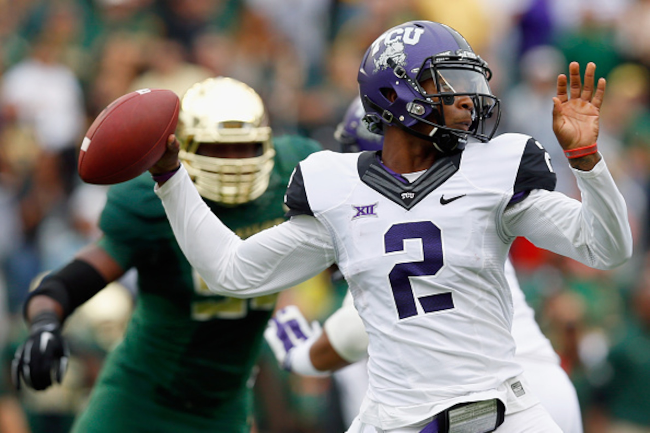WACO, TX - OCTOBER 11:  Trevone Boykin #2 of the TCU Horned Frogs looks for an open receiver in the first half against the Baylor Bears at McLane Stadium on October 11, 2014 in Waco, Texas.  (Photo by Tom Pennington/Getty Images)