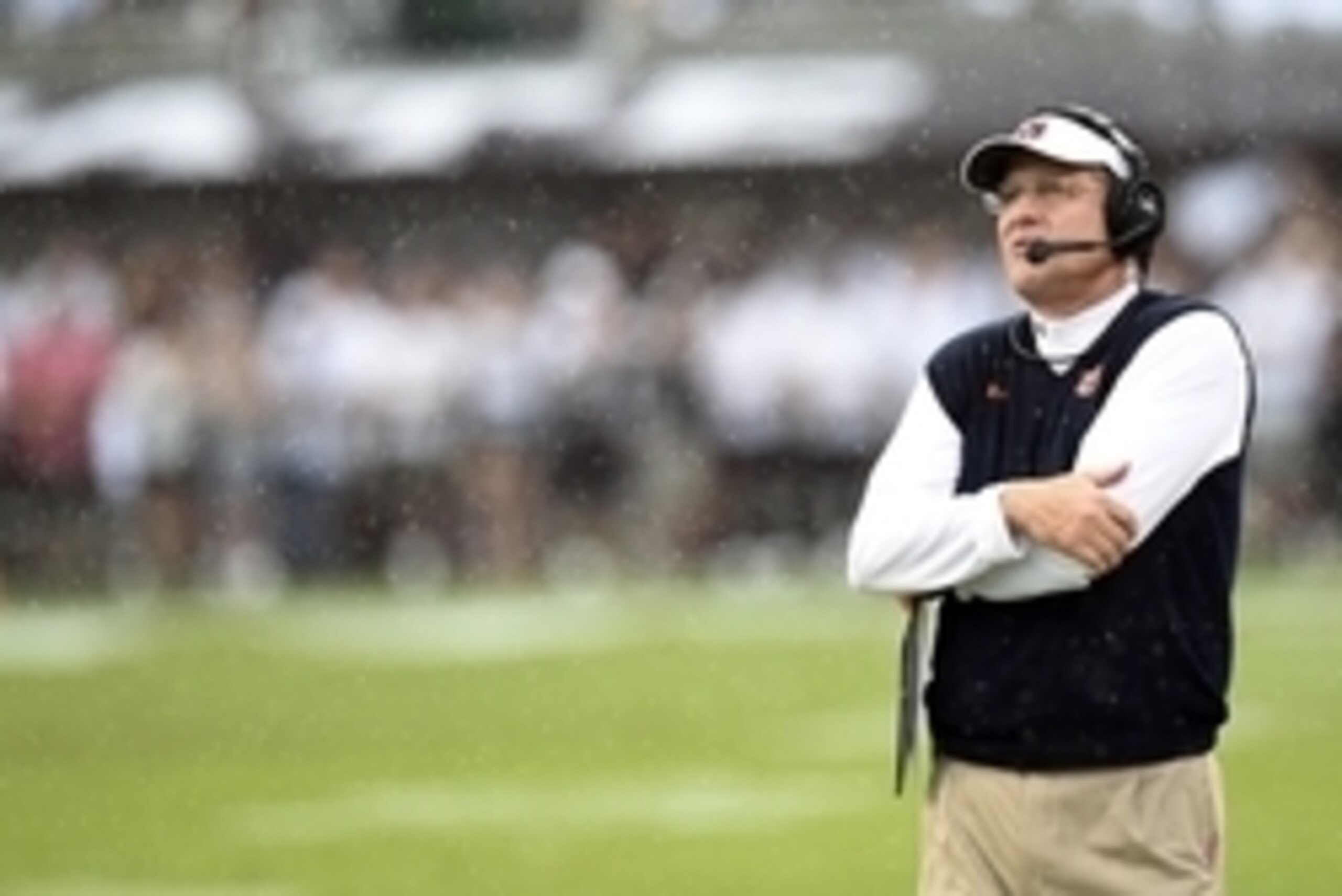 Oct 11, 2014; Starkville, MS, USA; Auburn Tigers head coach Gus Malzahn watches a play under review on the big screen against the Mississippi State Bulldogs during the third quarter at Davis Wade Stadium. Mississippi State defeated Auburn 38-23. Mandatory