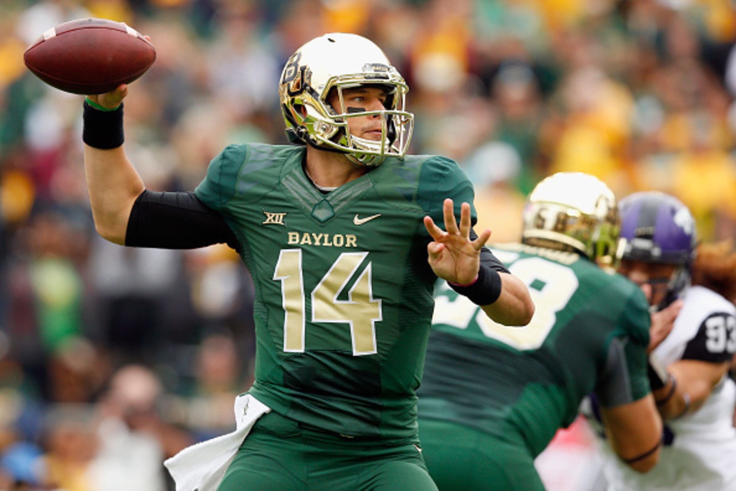 WACO, TX - OCTOBER 11: Bryce Petty #14 of the Baylor Bears looks for an open receiver in the first half against the TCU Horned Frogs at McLane Stadium on October 11, 2014 in Waco, Texas. (Photo by Tom Pennington/Getty Images) WACO, TX - OCTOBER 11: Bryce Petty #14 of the Baylor Bears looks for an open receiver in the first half against the TCU Horned Frogs at McLane Stadium on October 11, 2014 in Waco, Texas. (Photo by Tom Pennington/Getty Images)