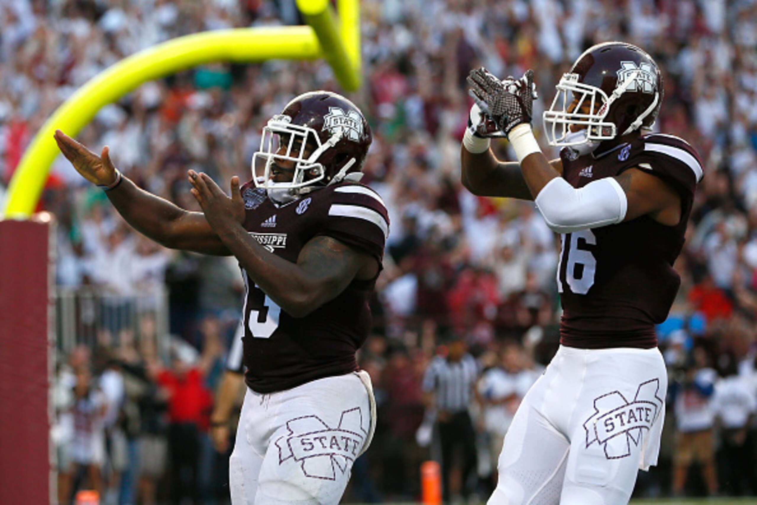 STARKVILLE, MS - OCTOBER 11:  Josh Robinson #13 of the Mississippi State Bulldogs celebrates his touchdown against the Auburn Tigers with Joe Morrow #16 at Davis Wade Stadium on October 11, 2014 in Starkville, Mississippi.  (Photo by Kevin C. Cox/Getty Im