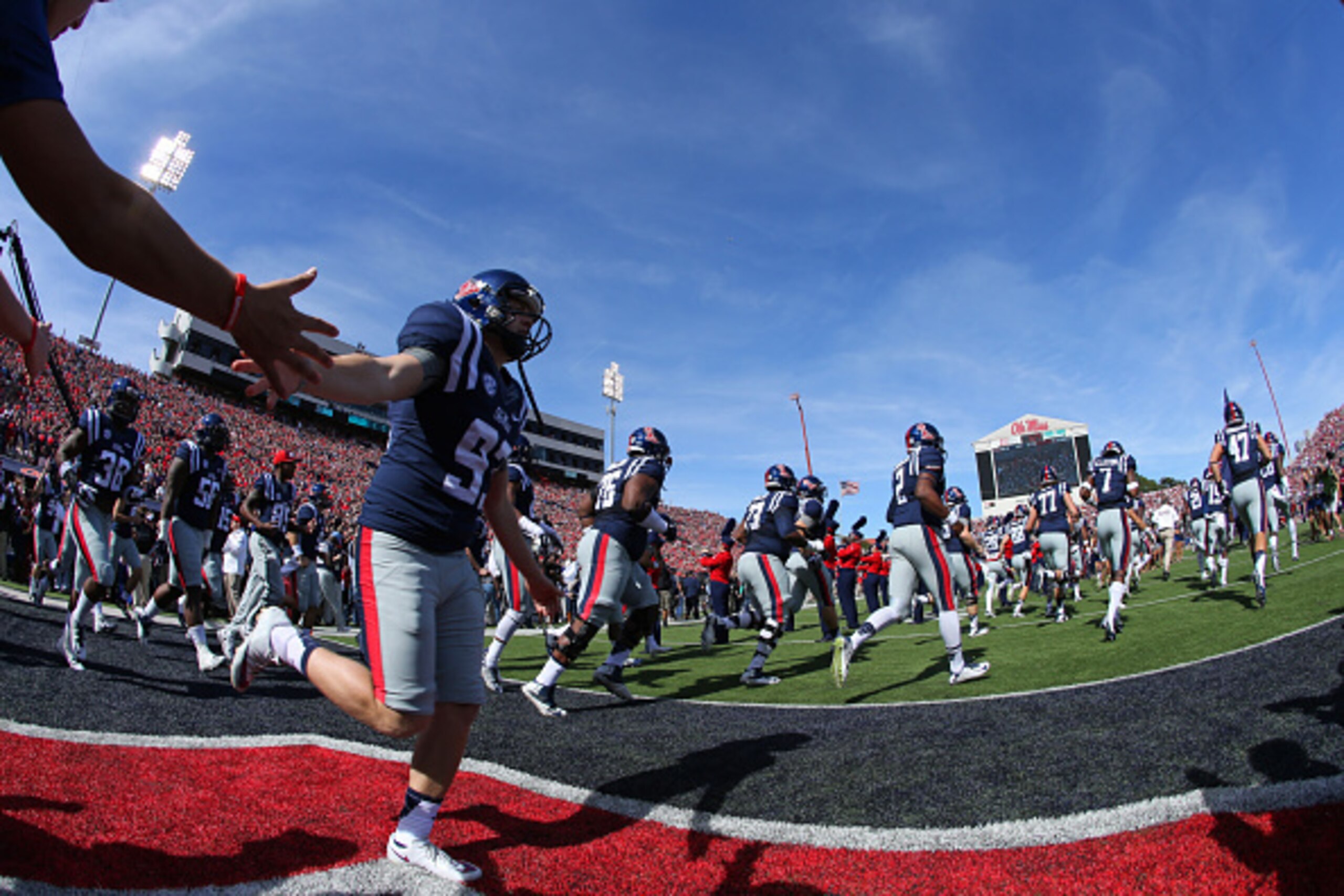 OXFORD, MS - OCTOBER 4: The Ole Miss Rebels take the field before a game against the Alabama Crimson Tide on October 4, 2014 at Vaught-Hemingway Stadium in Oxford, Mississippi. Mississippi beat Alabama 23-17. (Photo by Joe Murphy/Getty Images)
