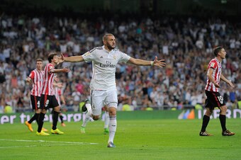 MADRID, SPAIN - OCTOBER 05:  Karim Benzema of Real Madrid celebrates after scoring his team's 2nd goal during the La Liga match between Real Madrid CF and Athletic Club at Estadio Santiago Bernabeu on October 5, 2014 in Madrid, Spain.  (Photo by Denis Doy