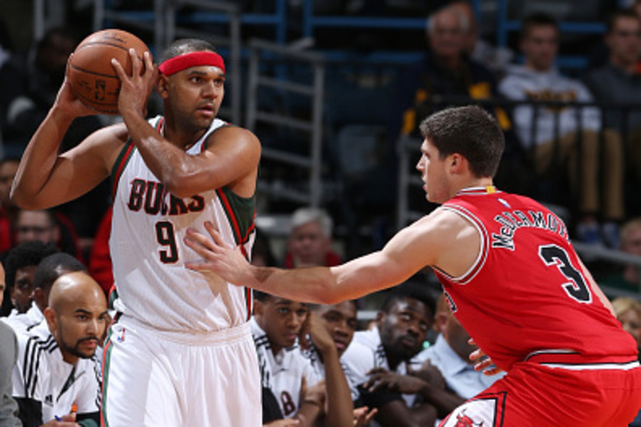 MILWAUKEE, WI - OCTOBER 11: Jared Dudley #9 of the Milwaukee Bucks looks to pass the ball as Doug McDermott #3 of the Chicago Bulls defends during the game on October 11, 2014 at BMO Harris Bradley Center, Milwaukee, Wisconsin. NOTE TO USER: User expressl