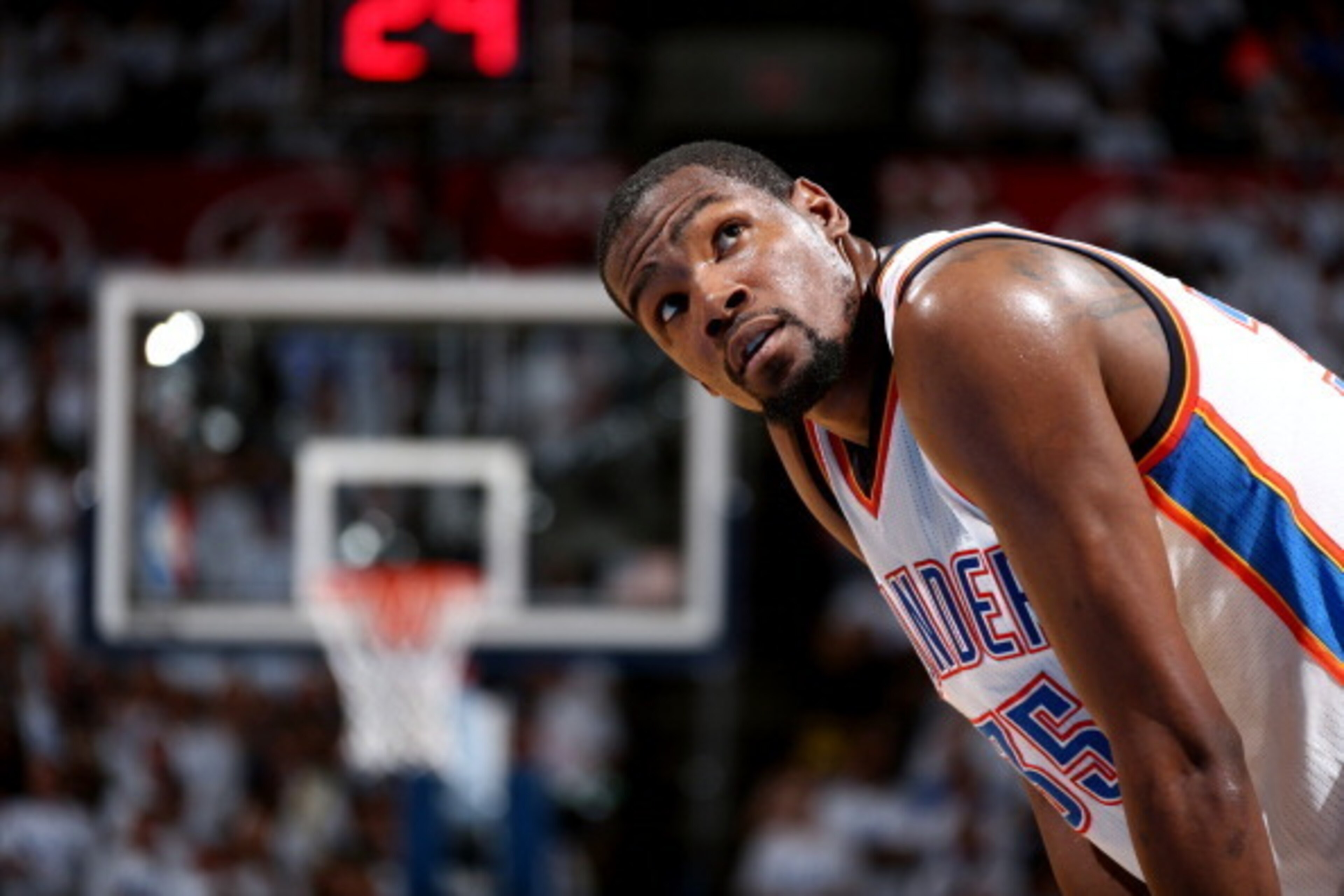 OKLAHOMA CITY, OK - May 31: Kevin Durant #35 of the Oklahoma City Thunder stands on the court during a game against the San Antonio Spurs in Game 6 of the Western Conference Finals during the 2014 NBA Playoffs at the Chesapeake Arena on May 31, 2014 in Ok