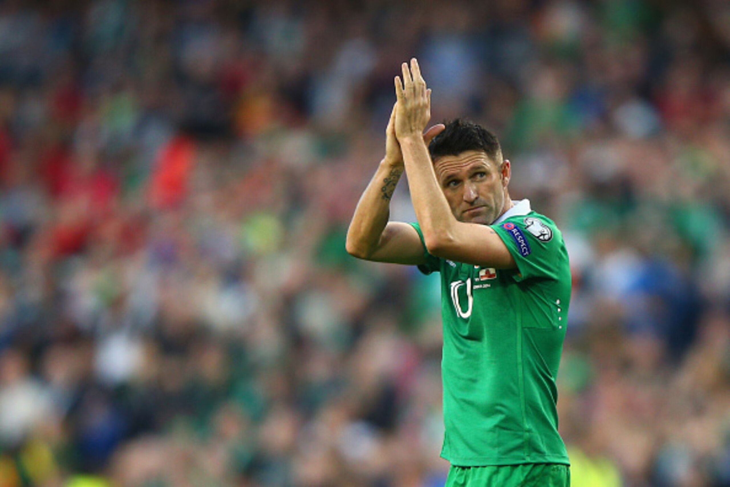 DUBLIN, IRELAND - OCTOBER 11:  Robbie Keane of Republic of Ireland applauds the fans during the EURO 2016 Qualifier match between Republic of Ireland and Gibraltar at Aviva Stadium on October 11, 2014 in Dublin, Ireland.  (Photo by Ian Walton/Getty Images