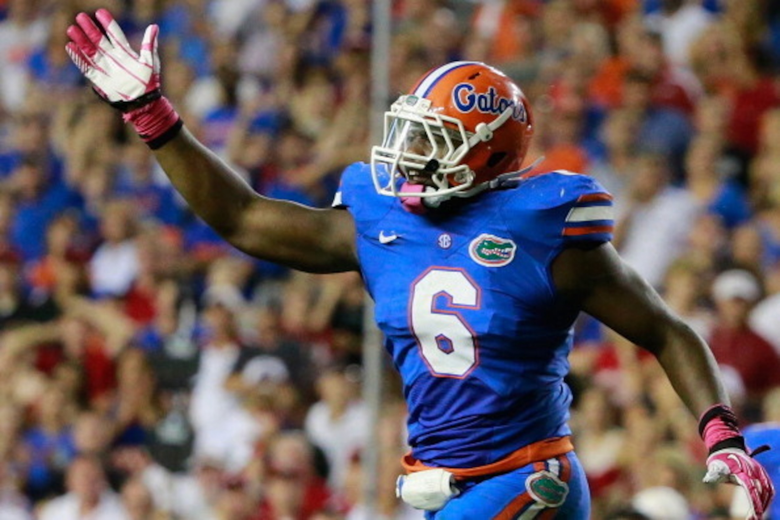 GAINESVILLE, FL - OCTOBER 05:  Dante Fowler Jr. #6 of the Florida Gators celebrates a fumble recovery during the game against the Arkansas Razorbacks at Ben Hill Griffin Stadium on October 5, 2013 in Gainesville, Florida.  (Photo by Sam Greenwood/Getty Im